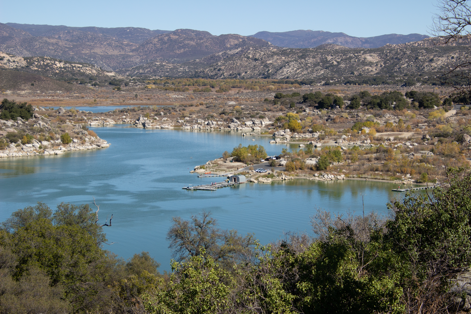 An image depicting the trail Morena Butte from Morena Reservoir and its surrounding area.