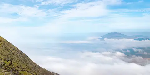 An image depicting the trail Mount Brandon from Faha and its surrounding area.