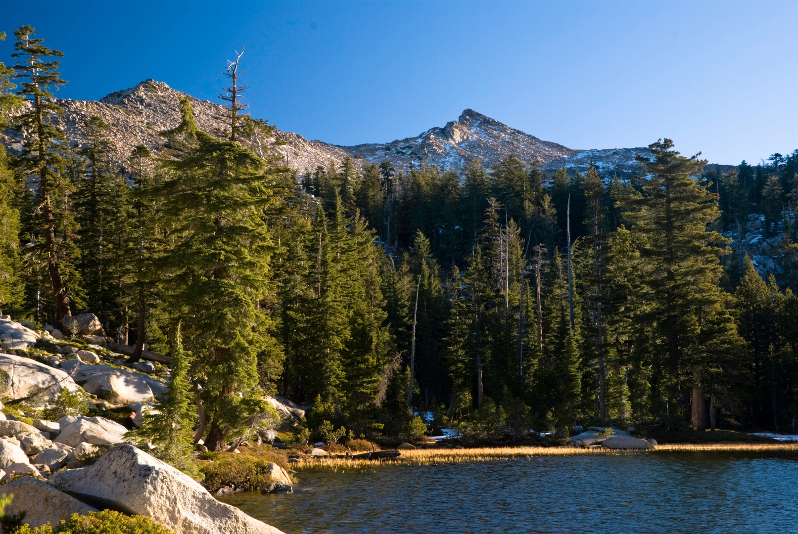 An image depicting the trail Grouse Lake via Twin Lakes Trail and its surrounding area.