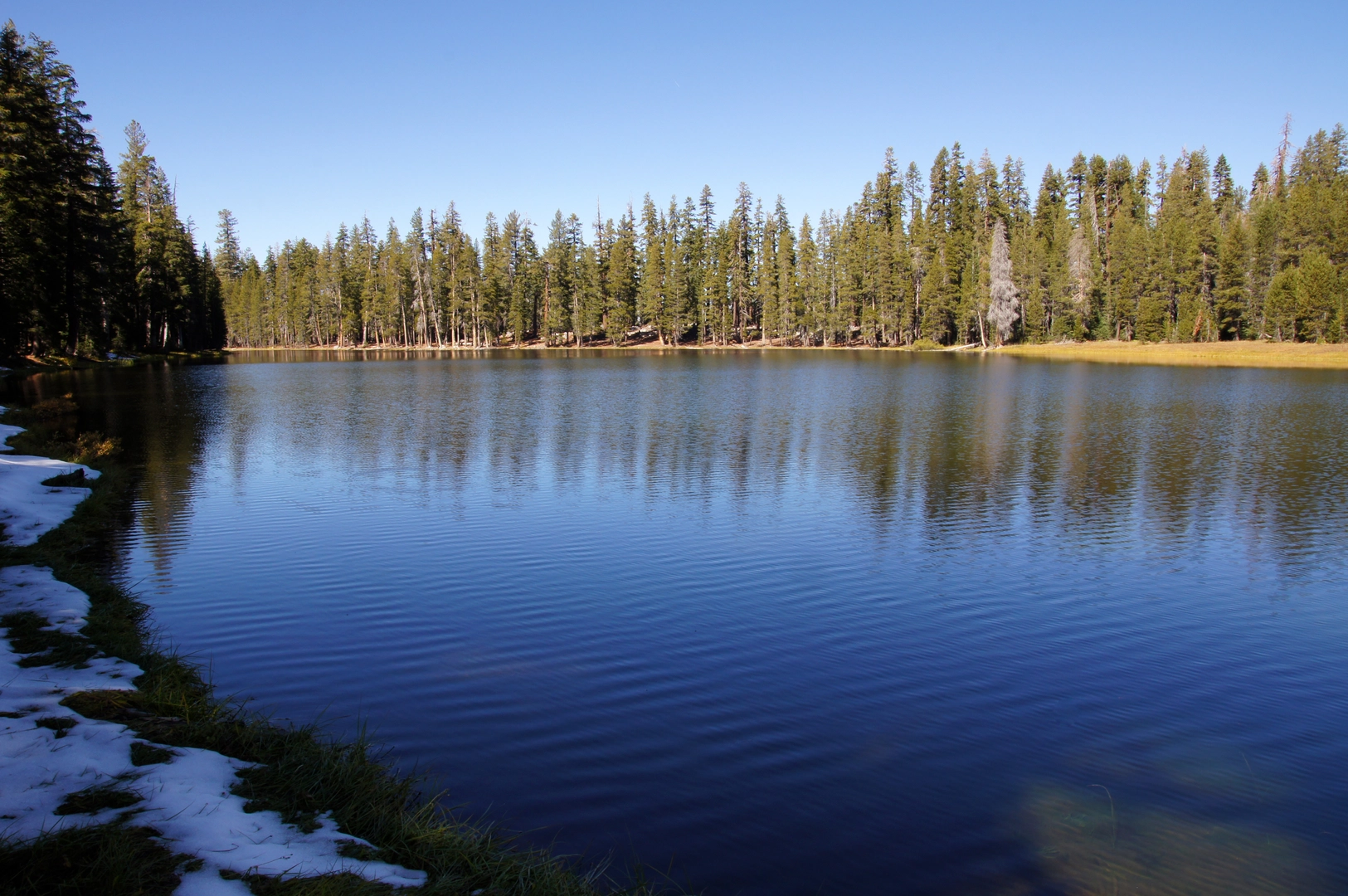 An image depicting the trail Lukens Lake from White Wolf and its surrounding area.