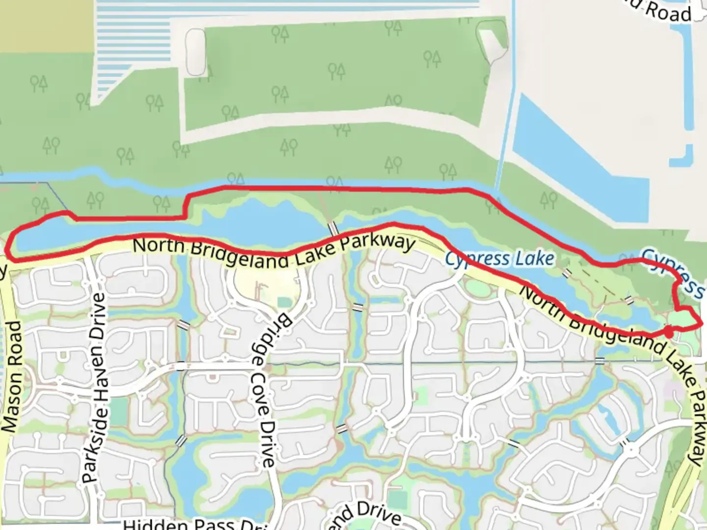 An image depicting the trail Cypress Creek and North Bridgeland Lake Parkway Loop and its surrounding area.
