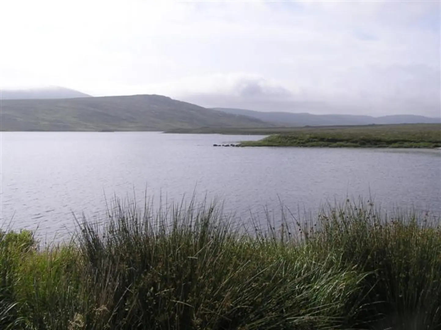 An image depicting the trail Slieve Snaught Loop from Lough Barra and its surrounding area.