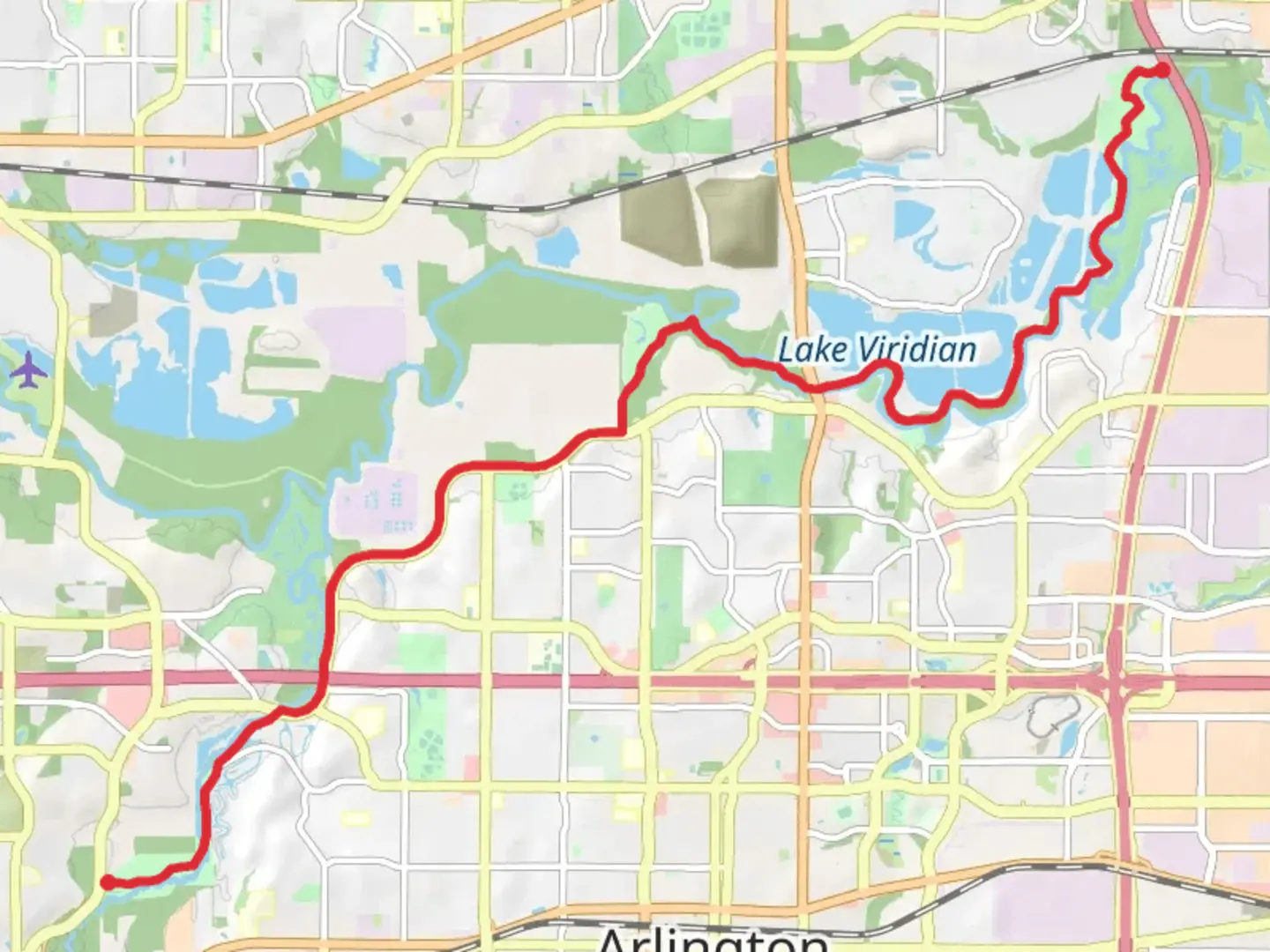 An image depicting the trail Village Creek and River Legacy Trail East and its surrounding area.