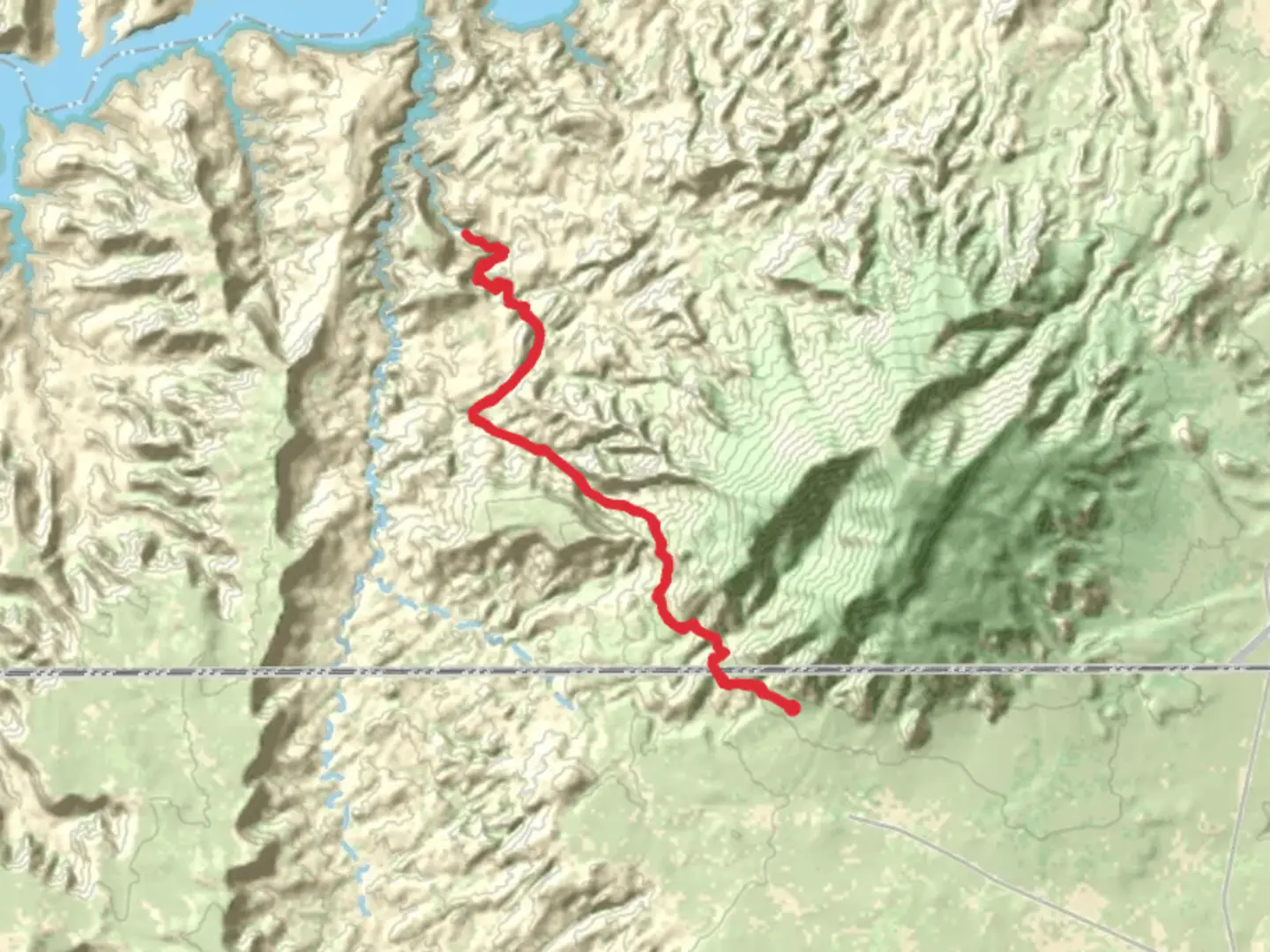 An image depicting the trail Rainbow Bridge national Monument and its surrounding area.