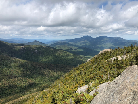 An image depicting the trail Nippletop and Bear Den Mountain Trail - Ausable Club Road and its surrounding area.