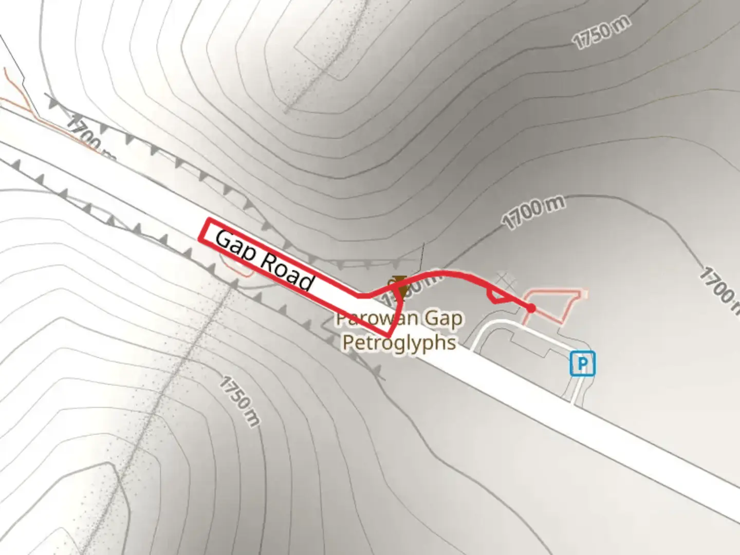An image depicting the trail Parowan Gap Petroglyph Trail and its surrounding area.