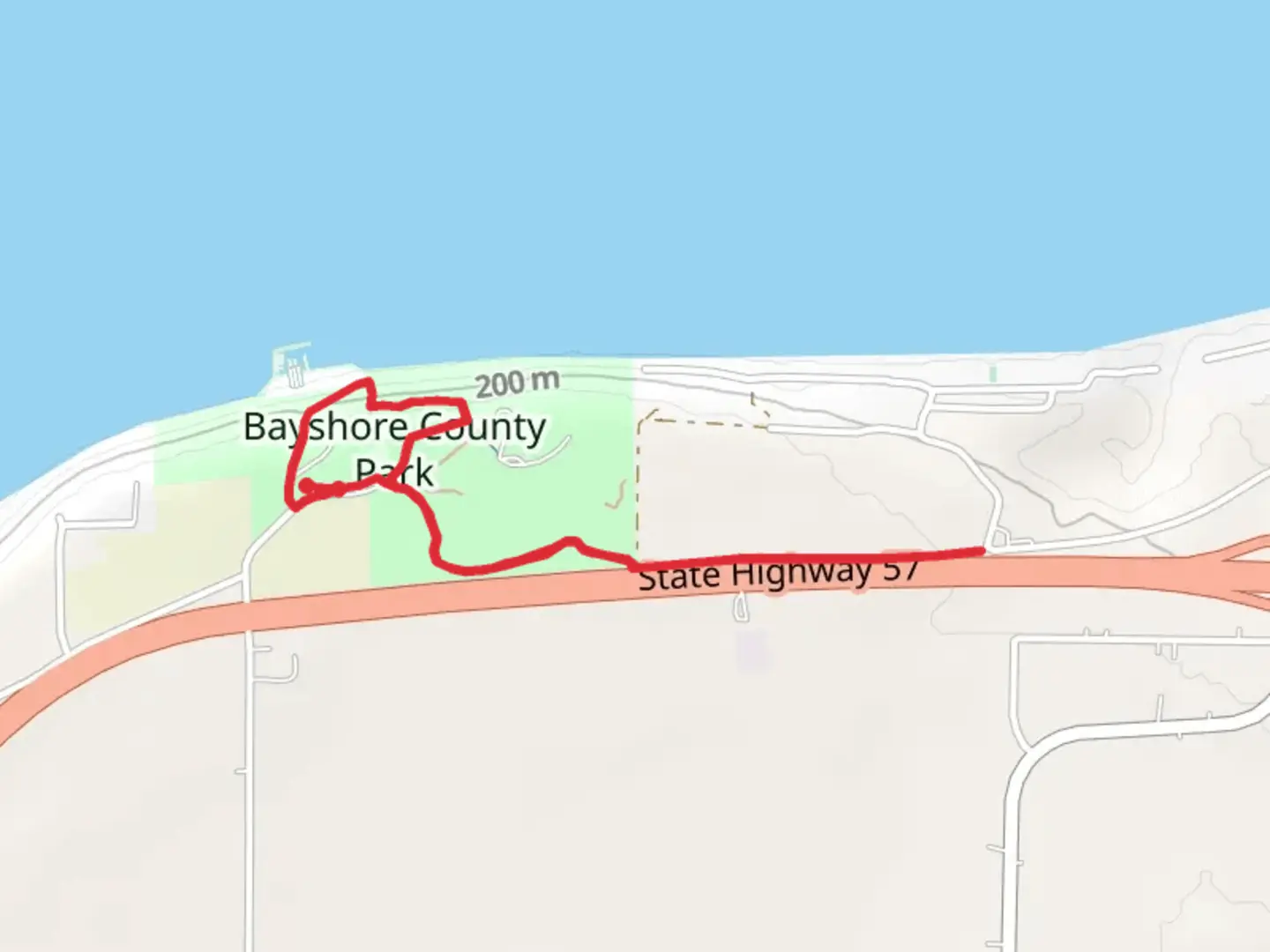 An image depicting the trail Bayshore County Park Walk and its surrounding area.