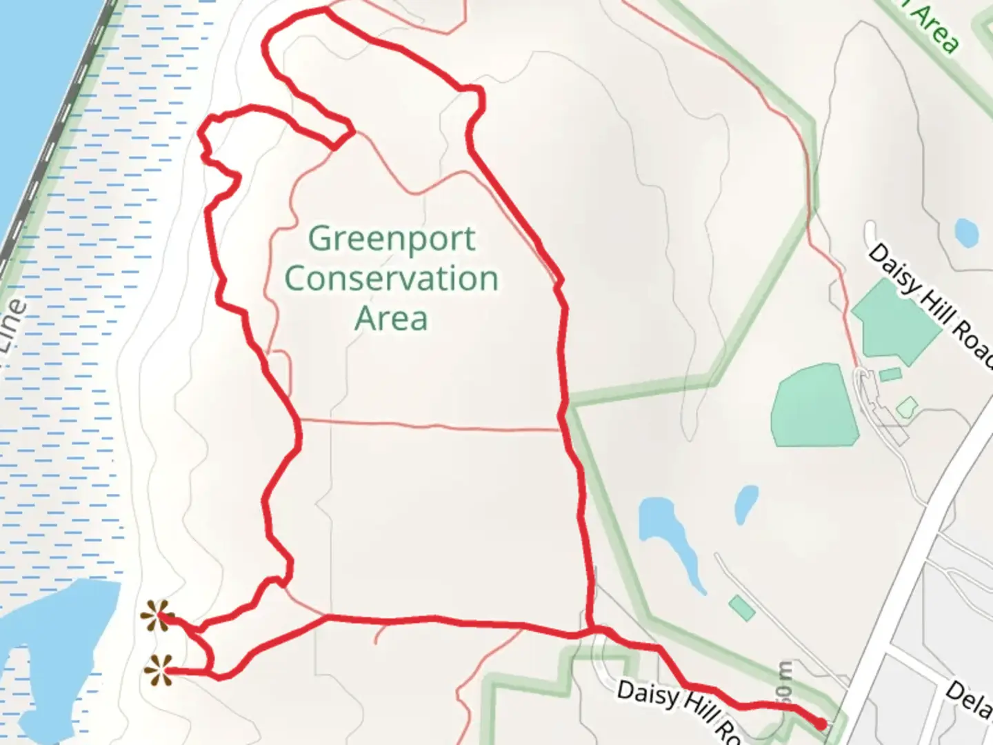 An image depicting the trail Greenport Conservation Area Loop and its surrounding area.