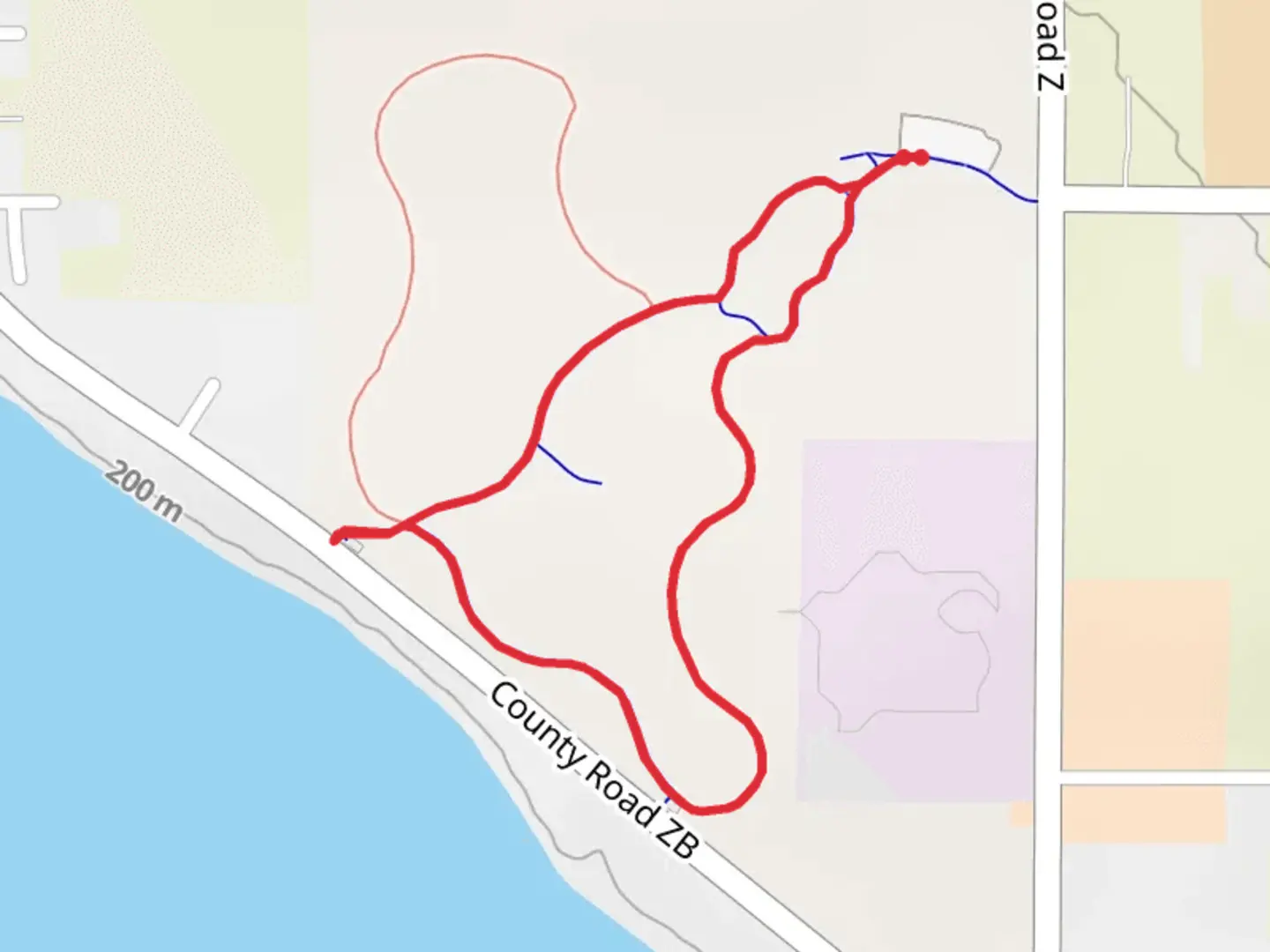An image depicting the trail Main Trail and South Loop and its surrounding area.