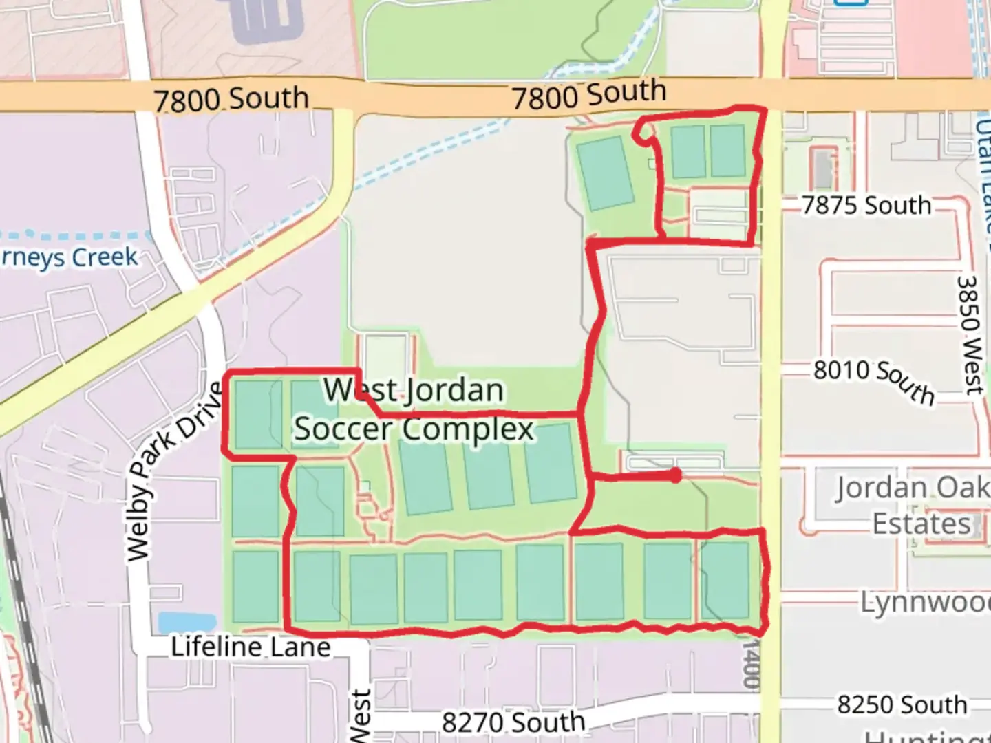An image depicting the trail West Jordan Soccer Complex Loop and its surrounding area.