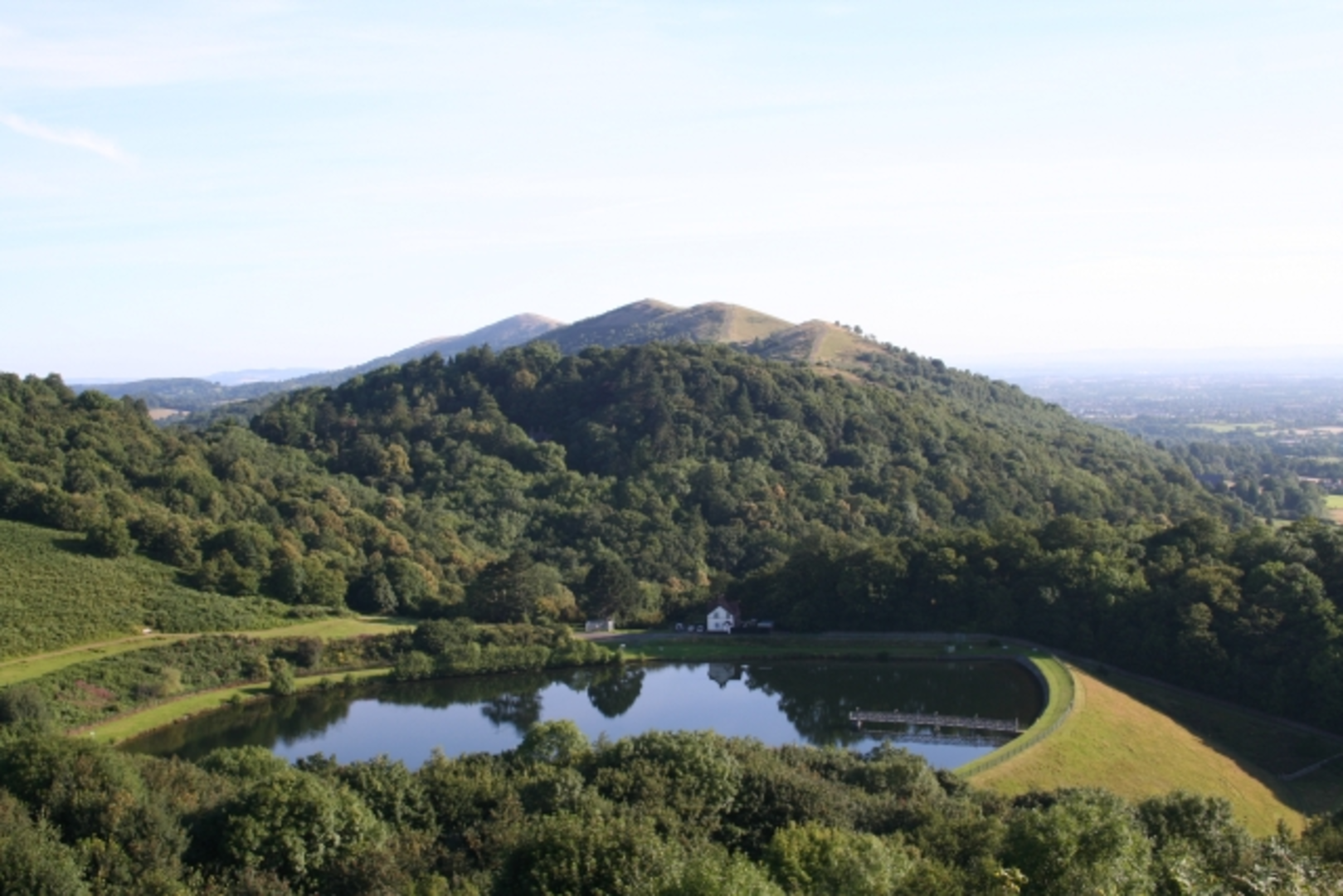 An image depicting the trail North Hill, Table Hill, Sugarloaf Hill, Perseverance Hill and British Camp Reservoir and its surrounding area.