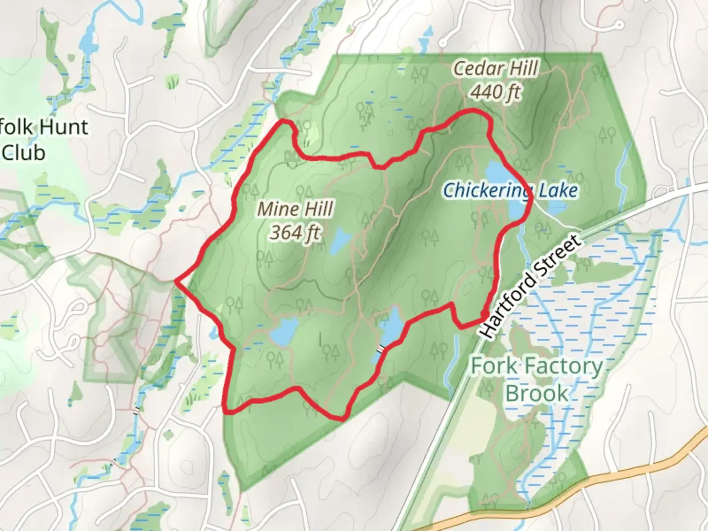 An image depicting the trail Rocky Woods Reservation Loop Trail and its surrounding area.