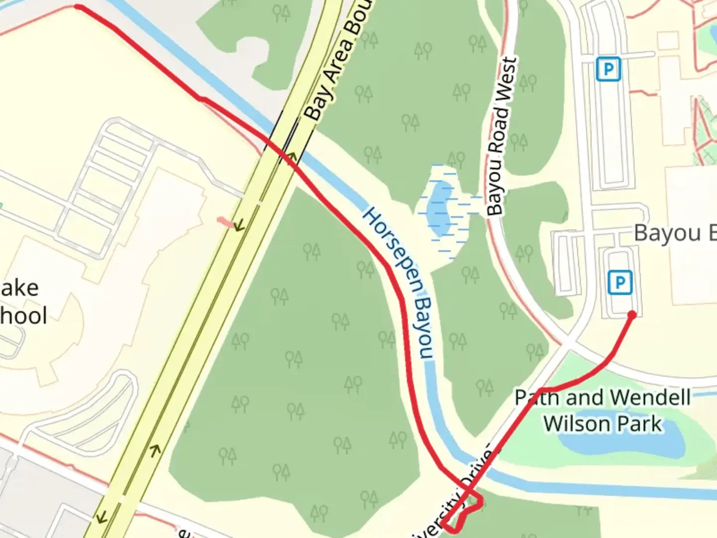 An image depicting the trail Walk beside Horsepen Bayou and its surrounding area.