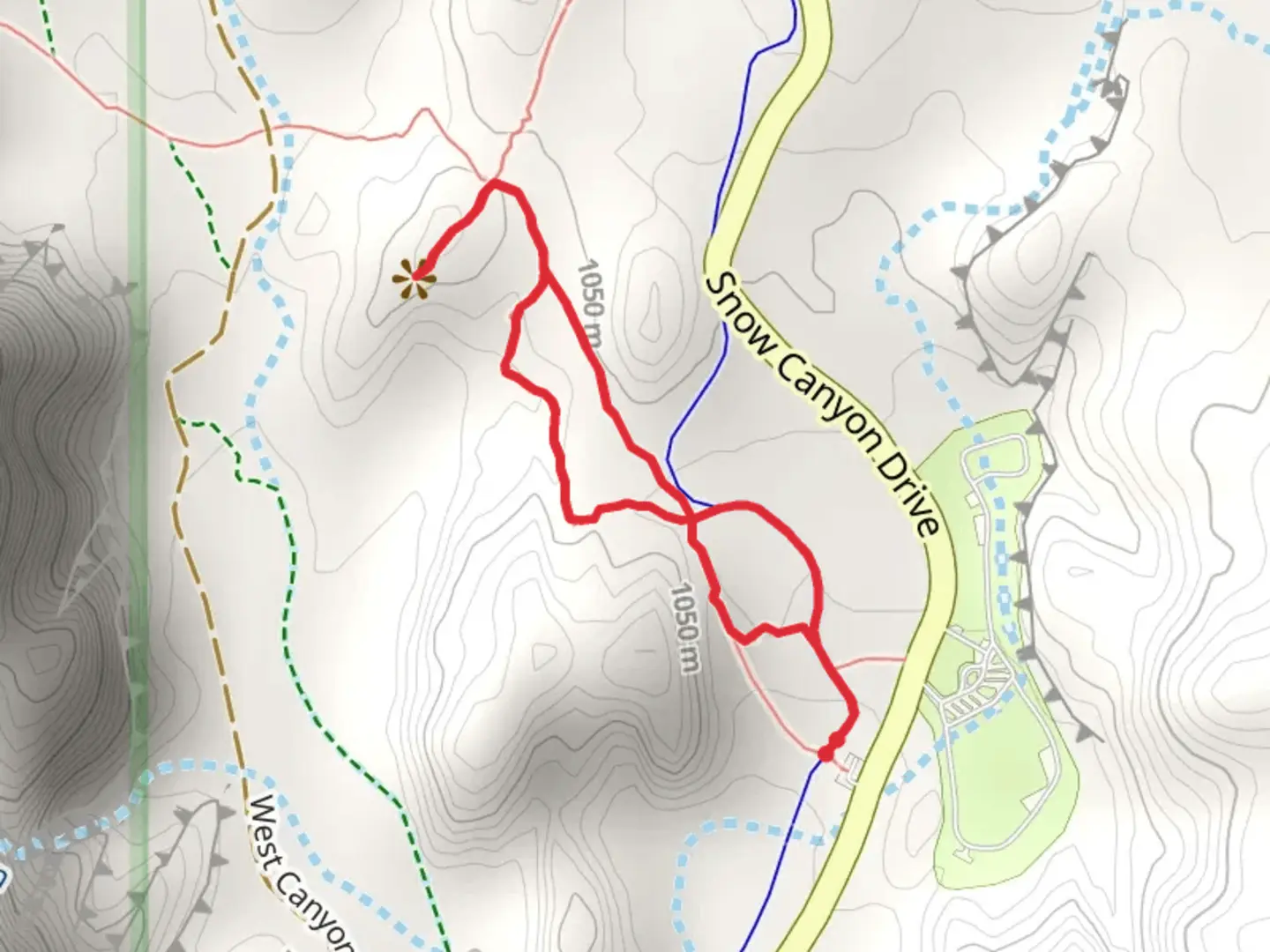 An image depicting the trail Whiptail Trail and Hidden Pinyon Overlook Trail and its surrounding area.