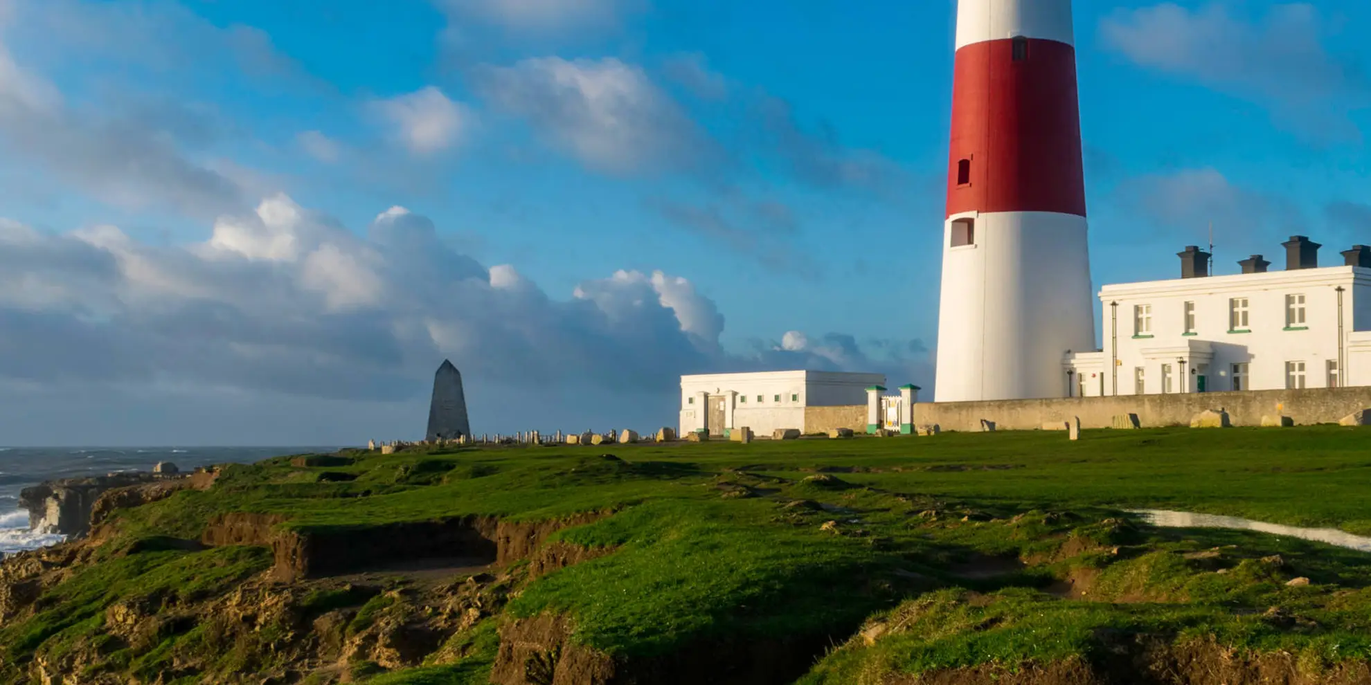 An image depicting the trail Portland Bill Walk and its surrounding area.