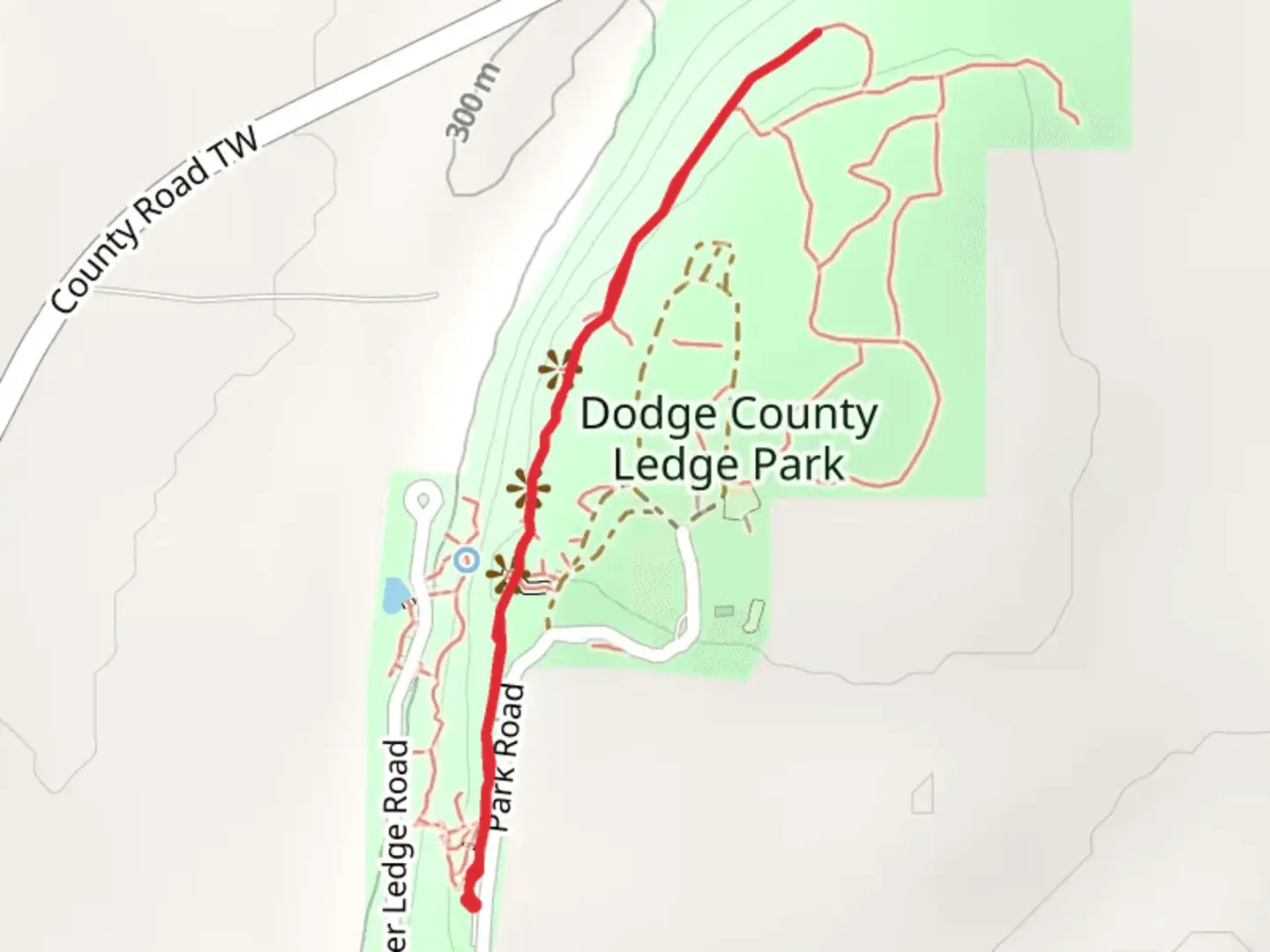 An image depicting the trail Dodge County Ledge Park and its surrounding area.