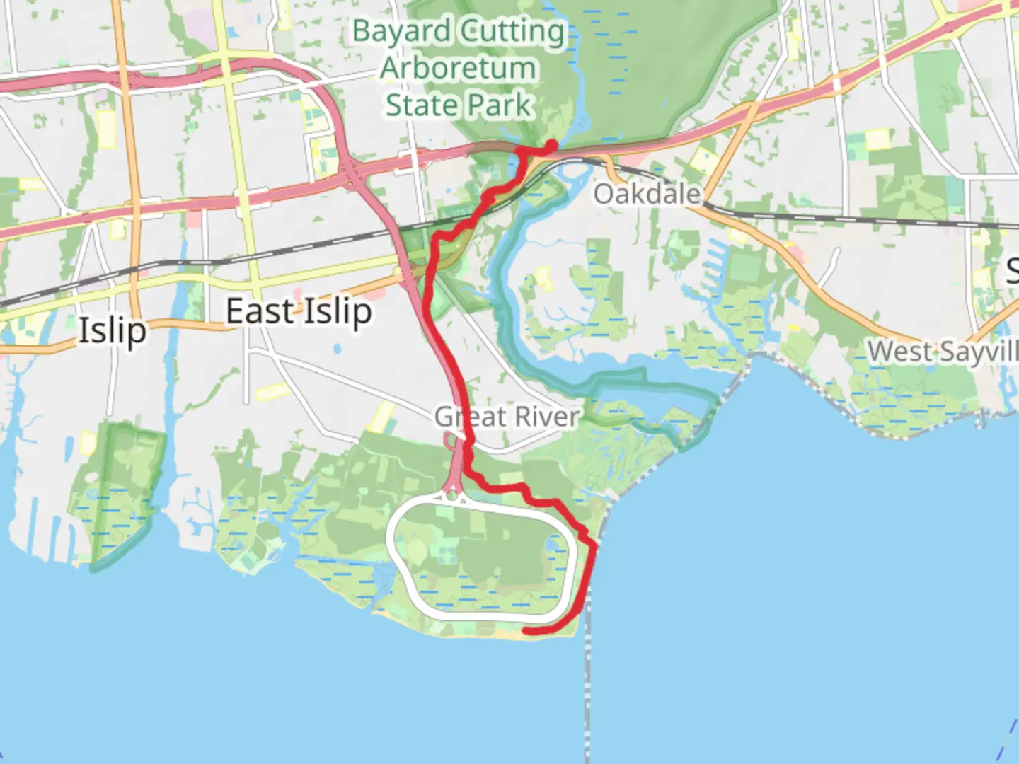 An image depicting the trail Long Island Greenbelt Trail from Lower Pond - Montauk Highway and its surrounding area.