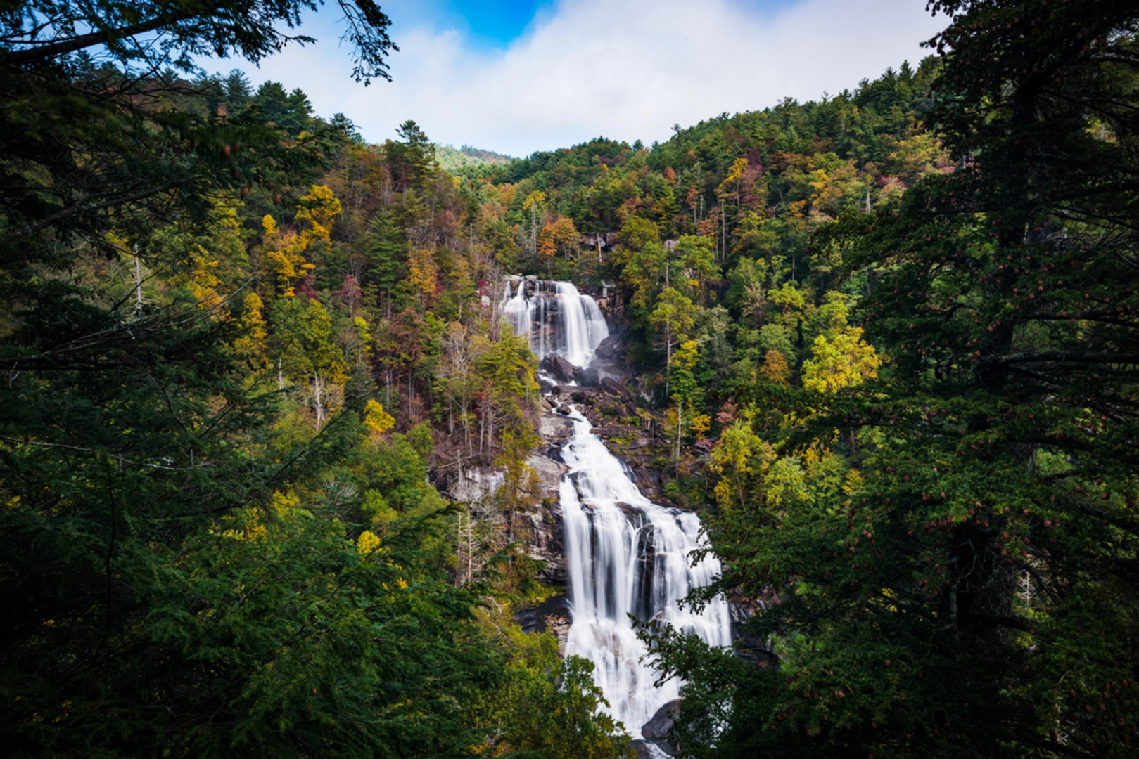 An image depicting the trail Whitewater Falls to Whitewater River Trail and its surrounding area.