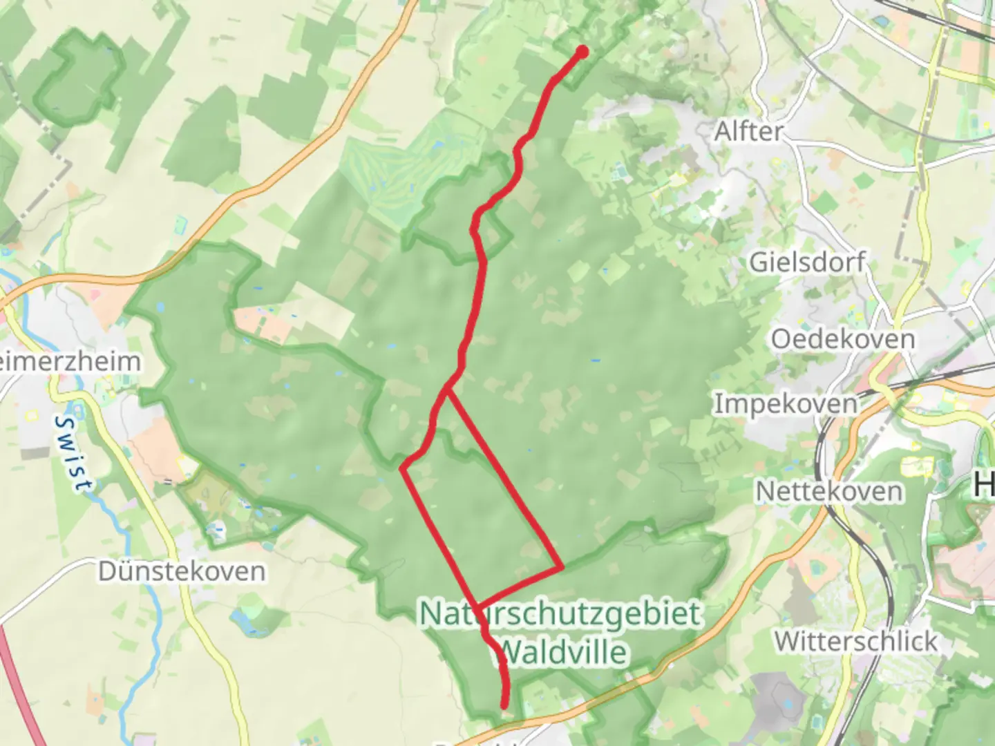 An image depicting the trail Naturschutzgebiet Waldville Loop and its surrounding area.