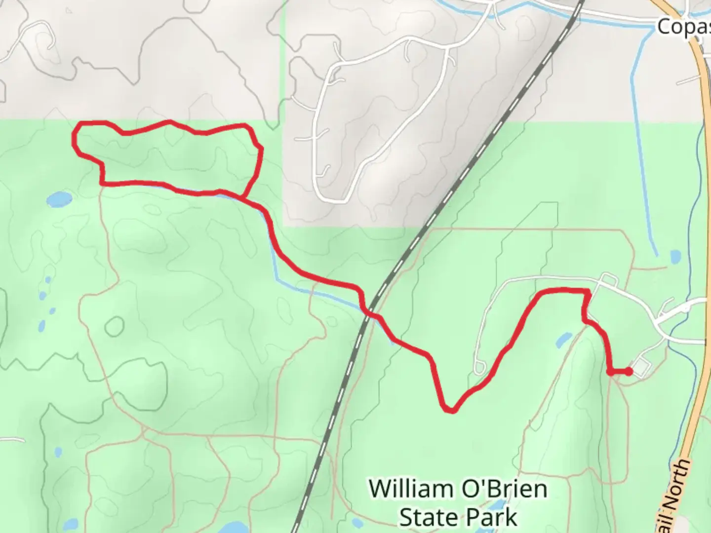 An image depicting the trail Woodland Edge Trail and Hardwood Hills Trail and its surrounding area.