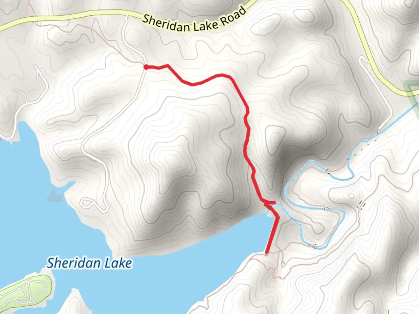 An image depicting the trail Sheridan Lake via Centennial Trail and its surrounding area.
