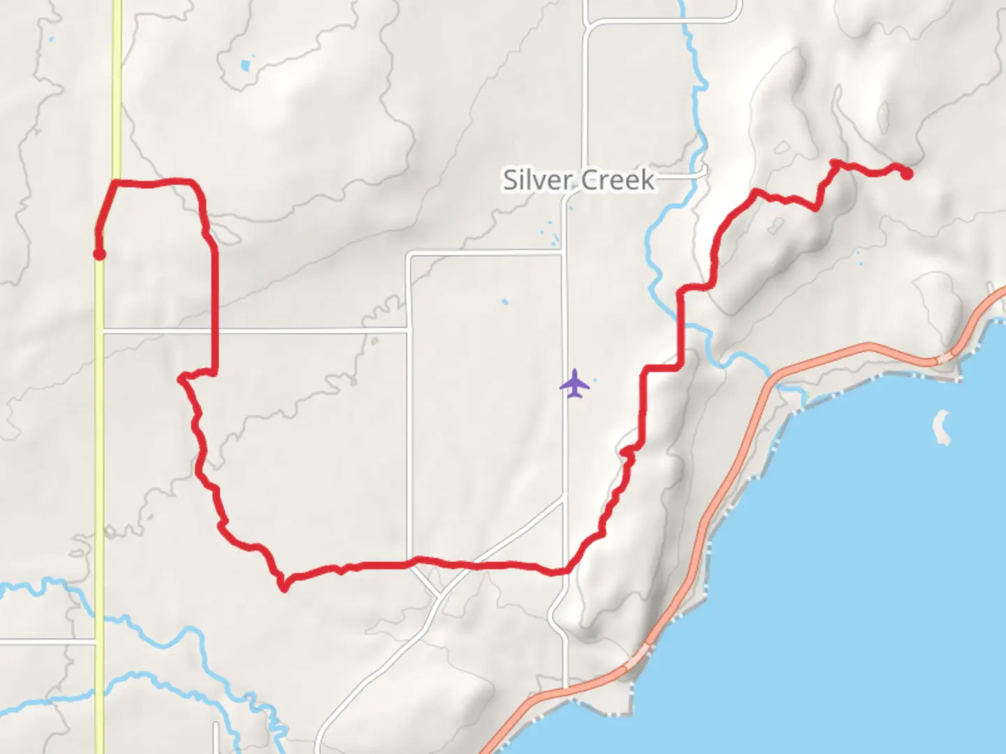 An image depicting the trail West Castle Danger Road and Reeves Road via Superior Hiking Trail and its surrounding area.