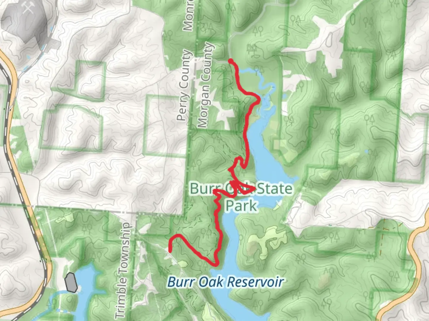 An image depicting the trail Burr Oak Backpack Trail - Sunday Creek Road and its surrounding area.
