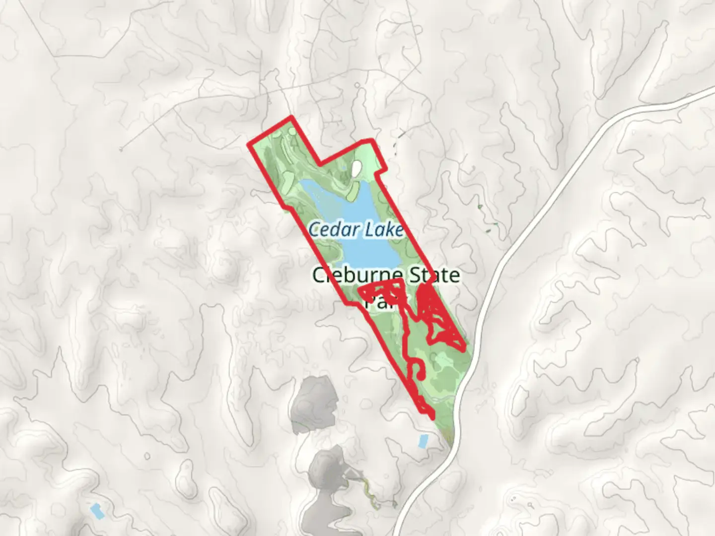 An image depicting the trail Cleburne State Park Loop and its surrounding area.