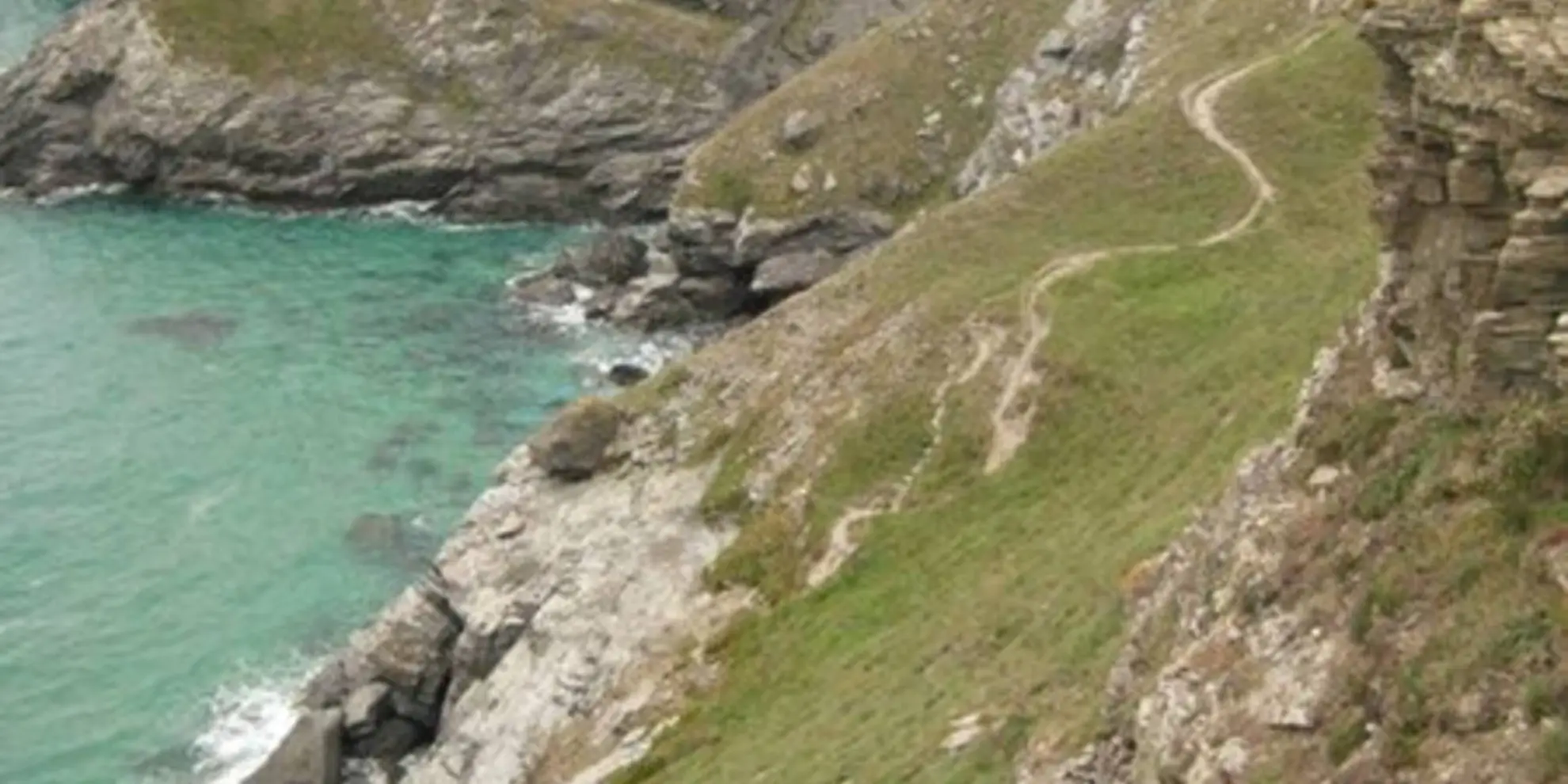 An image depicting the trail Park Head Walk and its surrounding area.