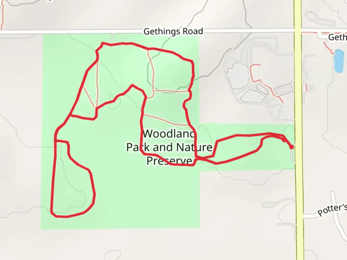 An image depicting the trail Woodland Park and Nature Preserve Loop and its surrounding area.