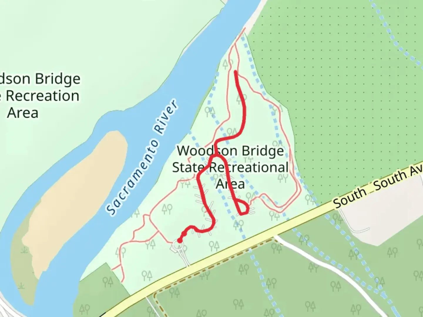 An image depicting the trail Woodson Bridge State Recreational Area and its surrounding area.