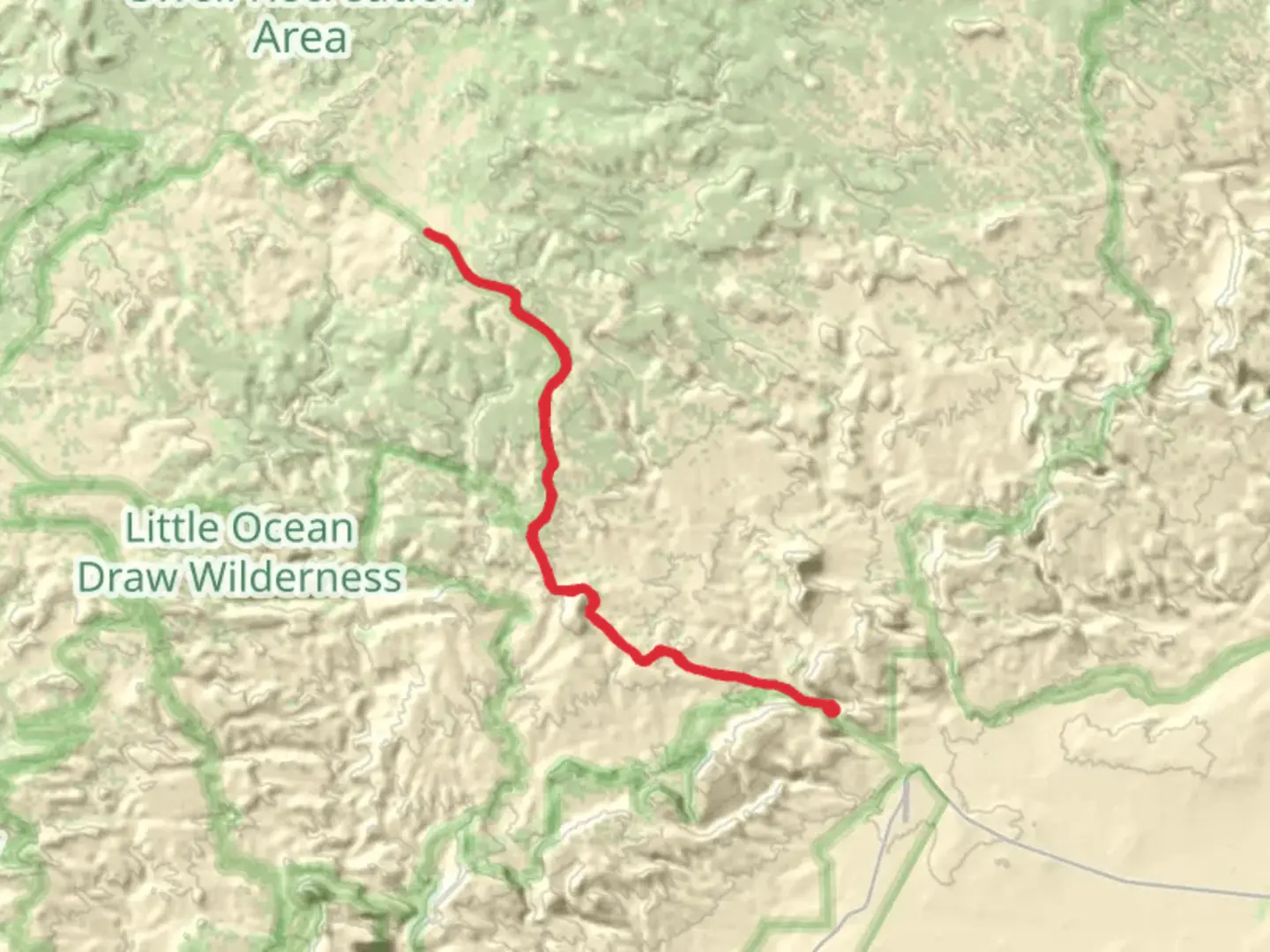 An image depicting the trail Temple Mountain Road and its surrounding area.