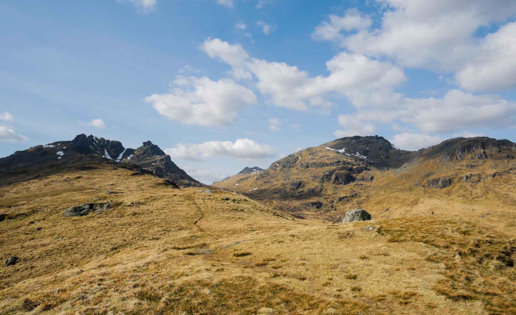 An image depicting the trail Beinn Ìme via Beinn Narnain and its surrounding area.