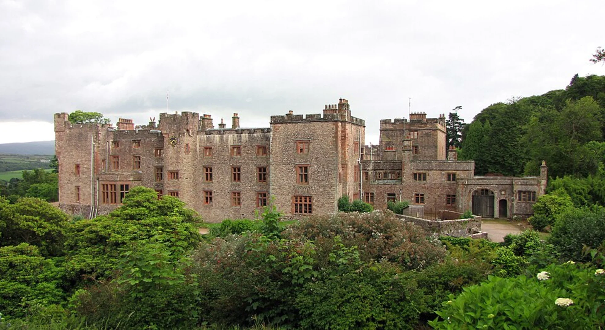 An image depicting the trail Muncaster Castle Walk and its surrounding area.