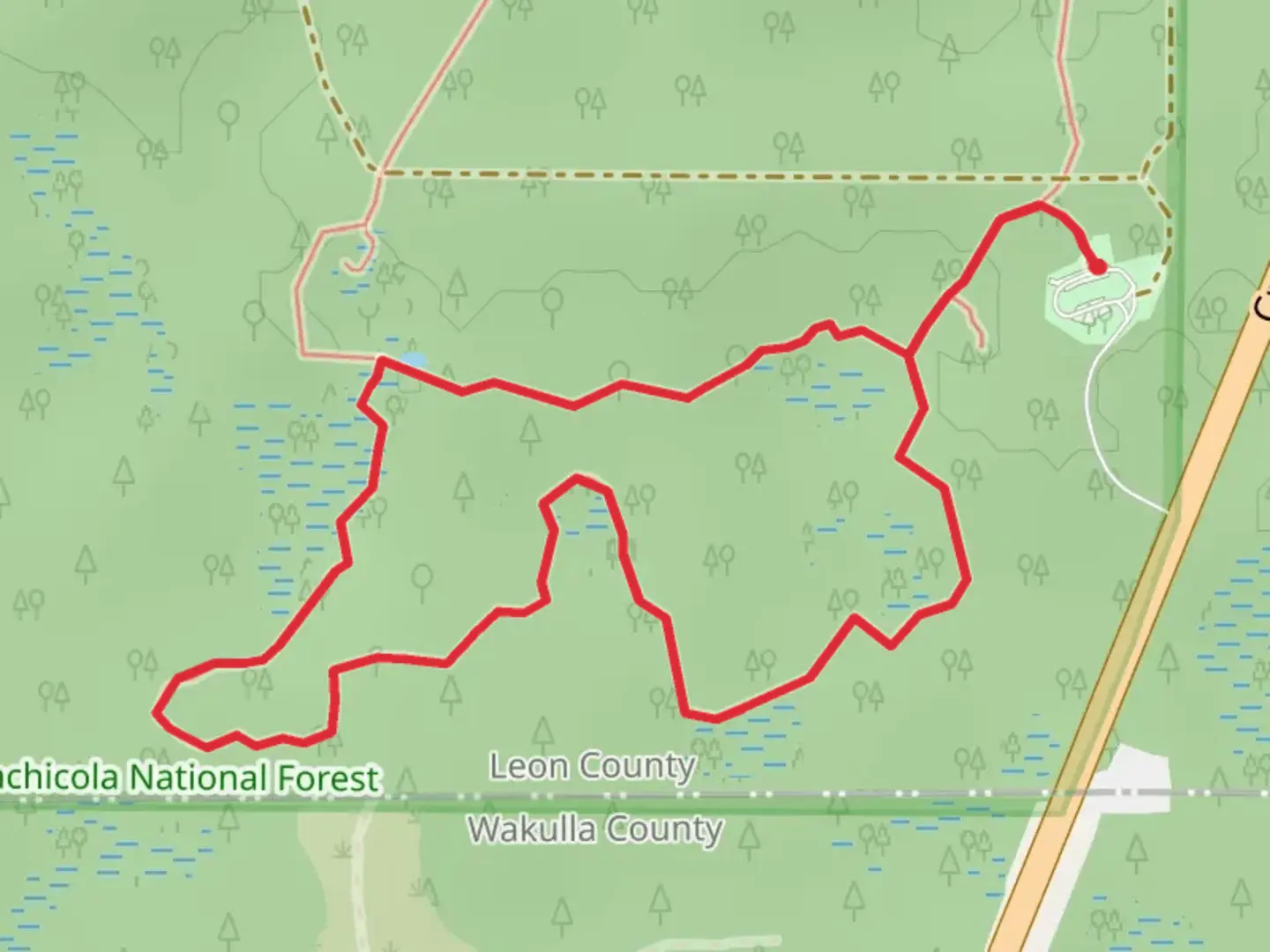 An image depicting the trail Crossover - Gumswamp Loop Trail and its surrounding area.
