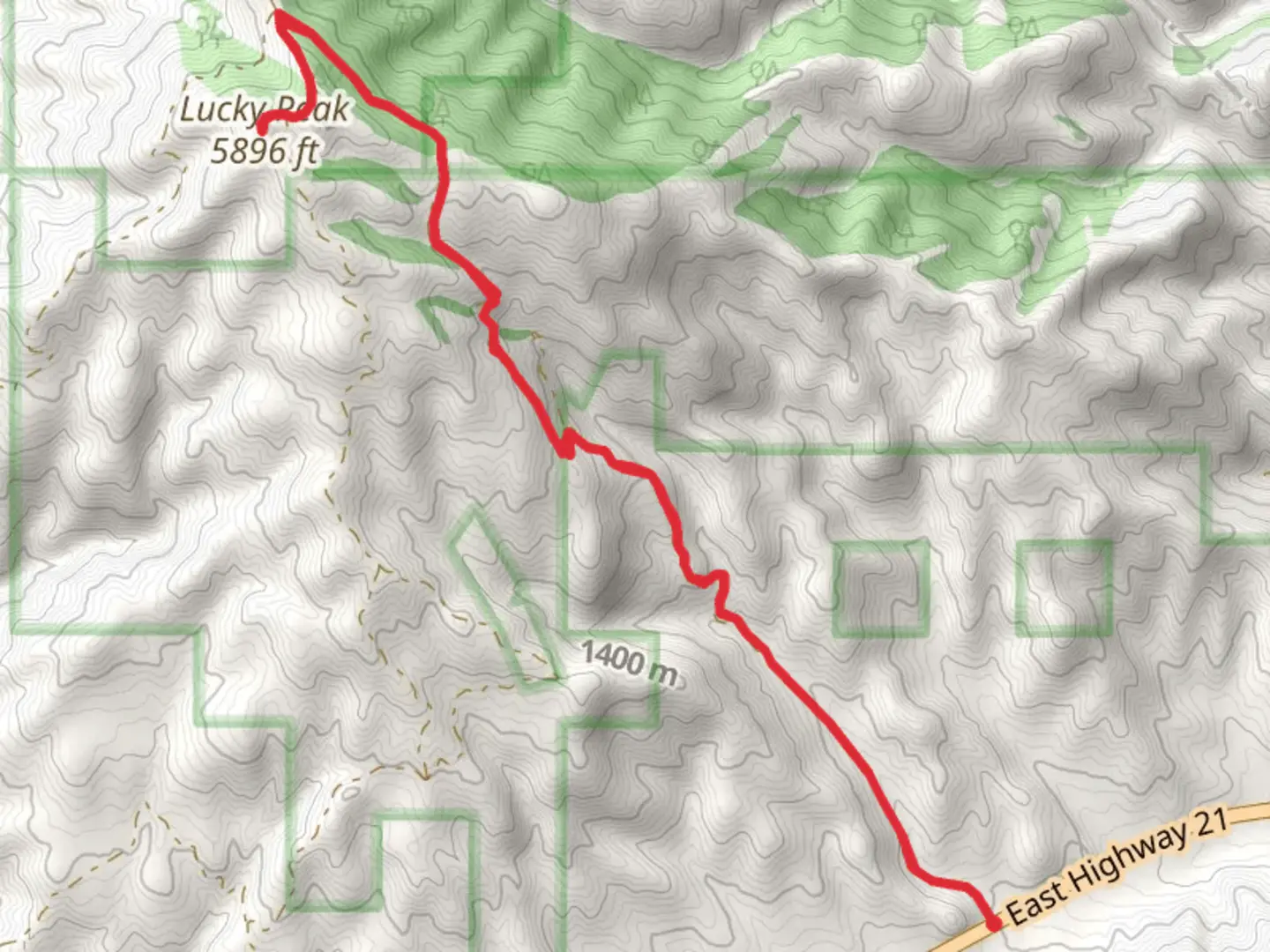 An image depicting the trail Lucky Peak from East Highway 21 and its surrounding area.