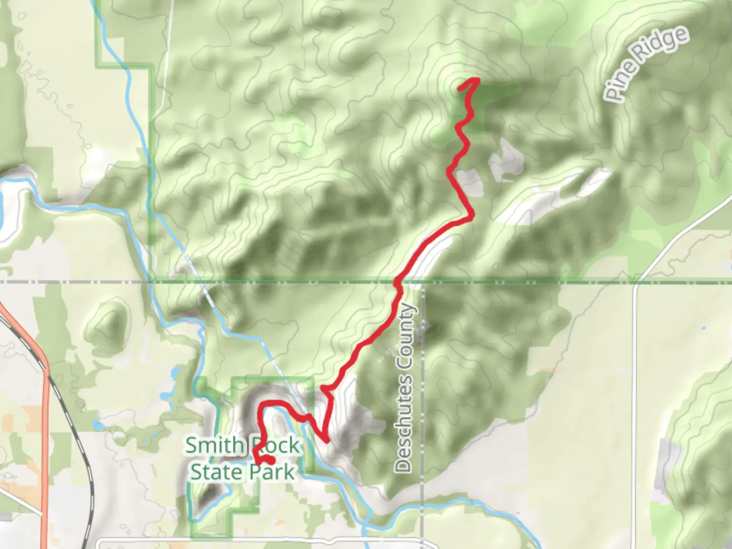 An image depicting the trail Gray Butte via Wolf Tree Trail and its surrounding area.