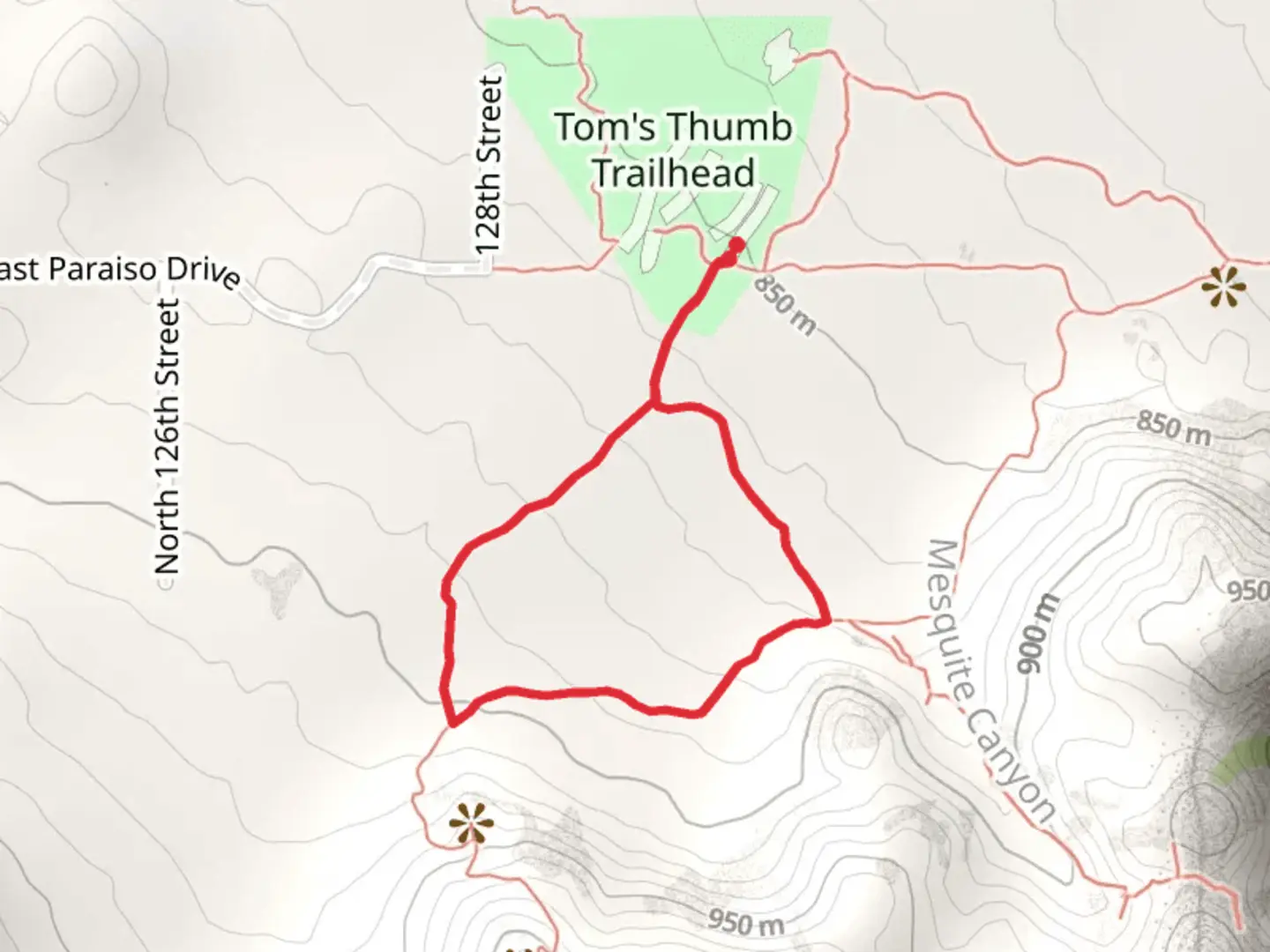 An image depicting the trail Tom's Thumb and Mesquite Canyon Loop Trail and its surrounding area.