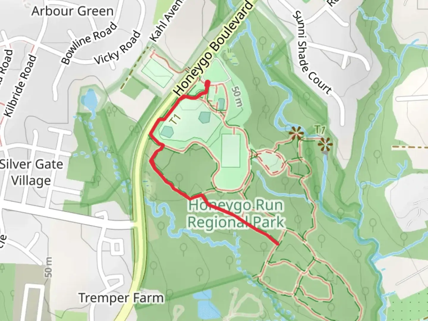 An image depicting the trail Honeygo Boulevard - Green Trail and its surrounding area.