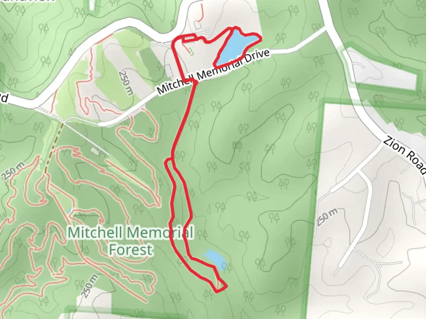 An image depicting the trail Mitchell Memorial Drive North-South Loop and its surrounding area.