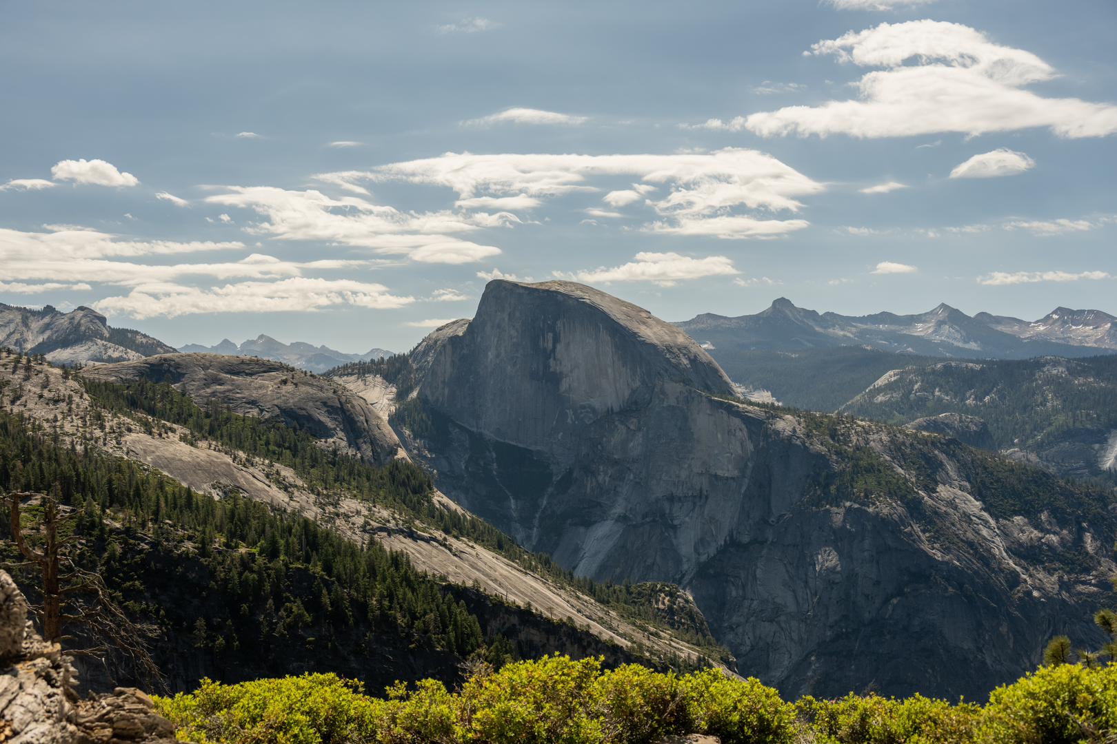 An image depicting the trail North Dome and Upper Yosemite Fall Trail and its surrounding area.