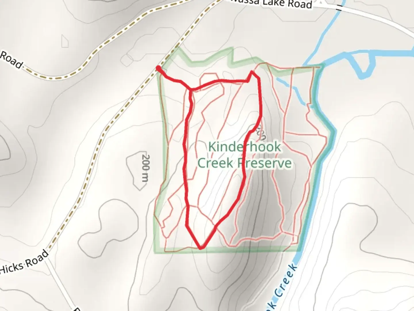 An image depicting the trail Woods Road Trail - White and Ridge Top Trail - Red Loop and its surrounding area.