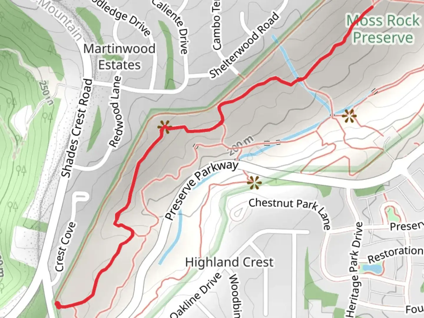 An image depicting the trail Moss Rock Preserve Blue Trail and its surrounding area.