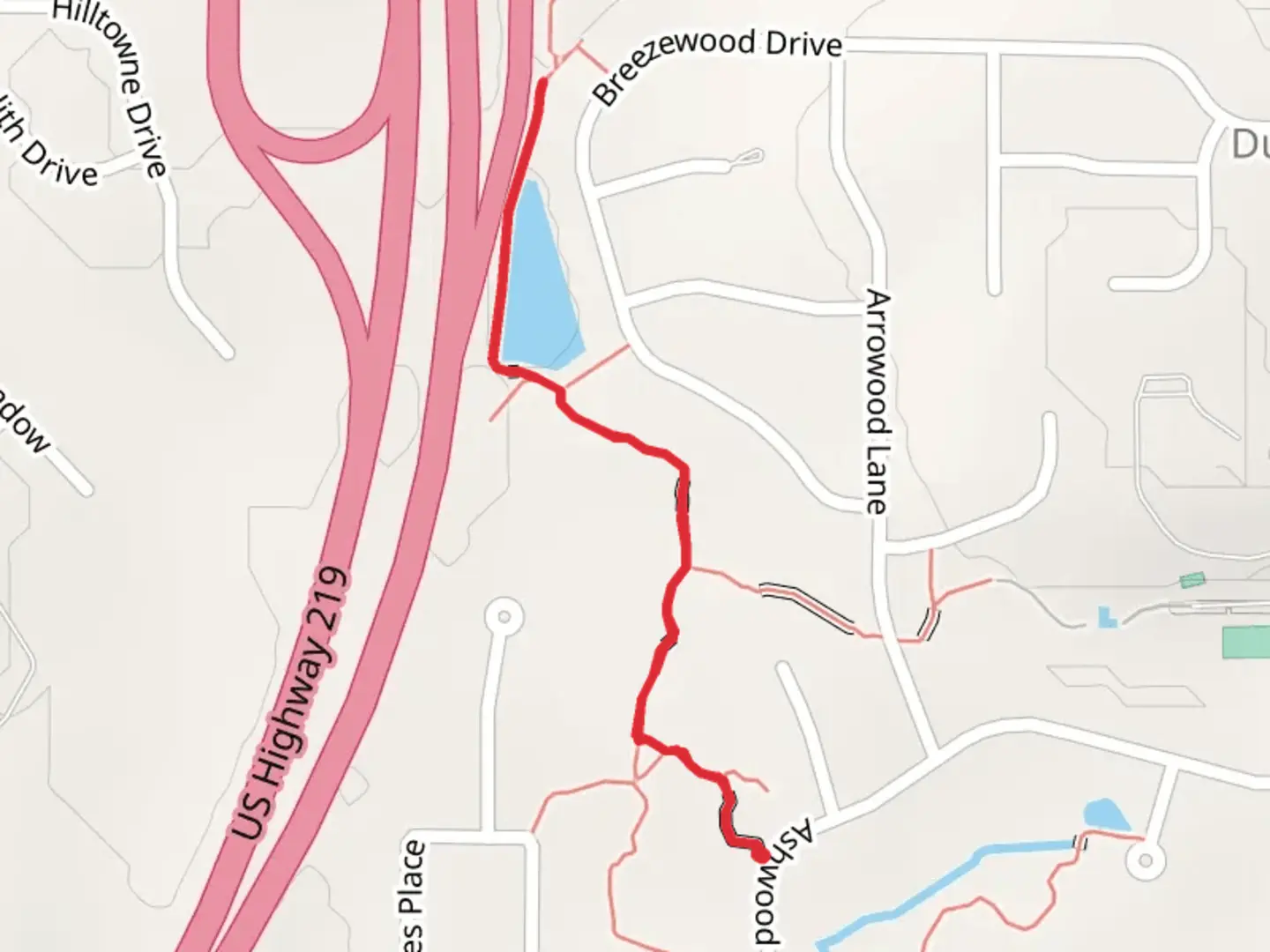 An image depicting the trail Ashwood Lane to Breezewood Drive and its surrounding area.