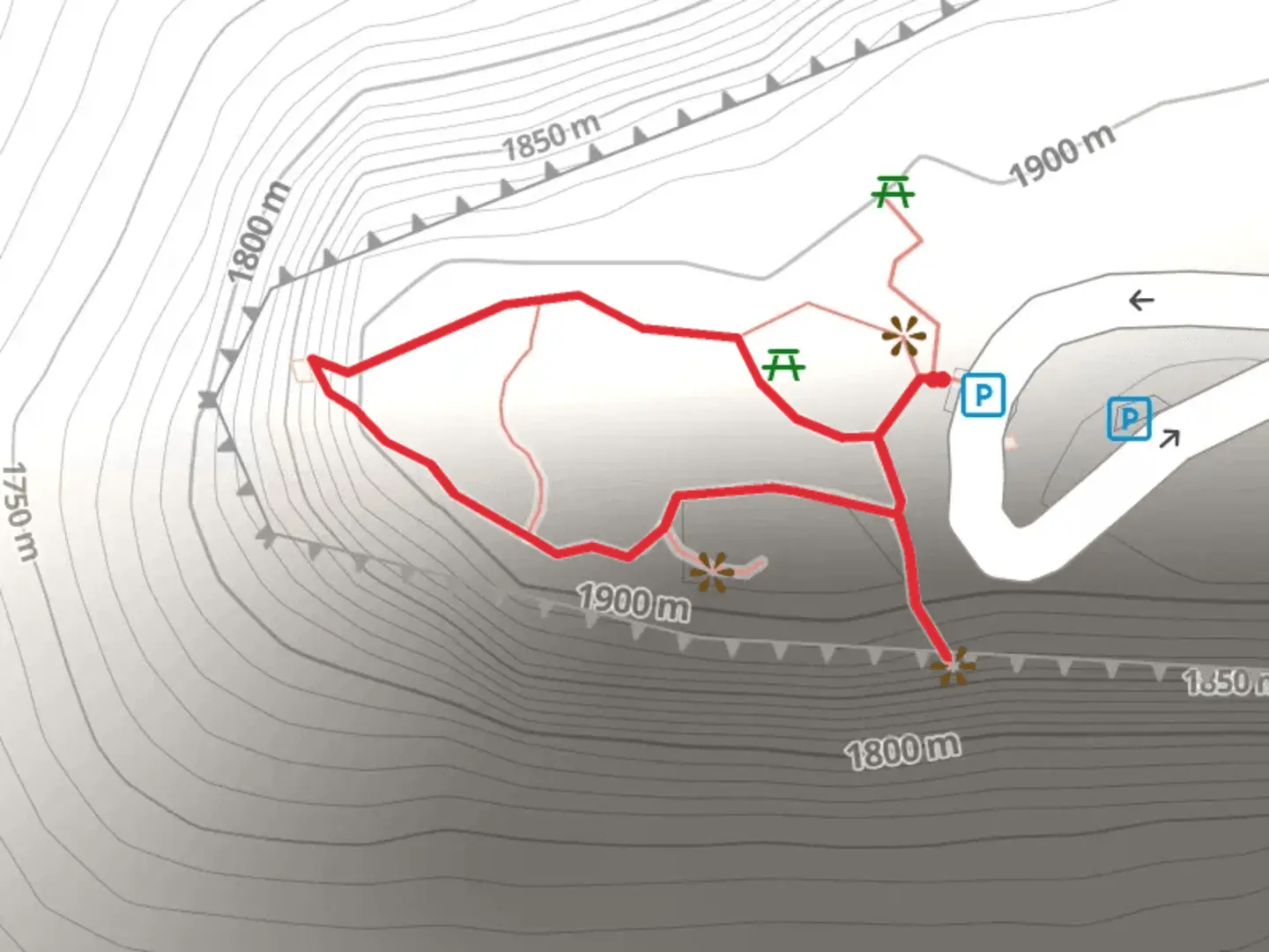 An image depicting the trail Needles Overlook Loop and its surrounding area.