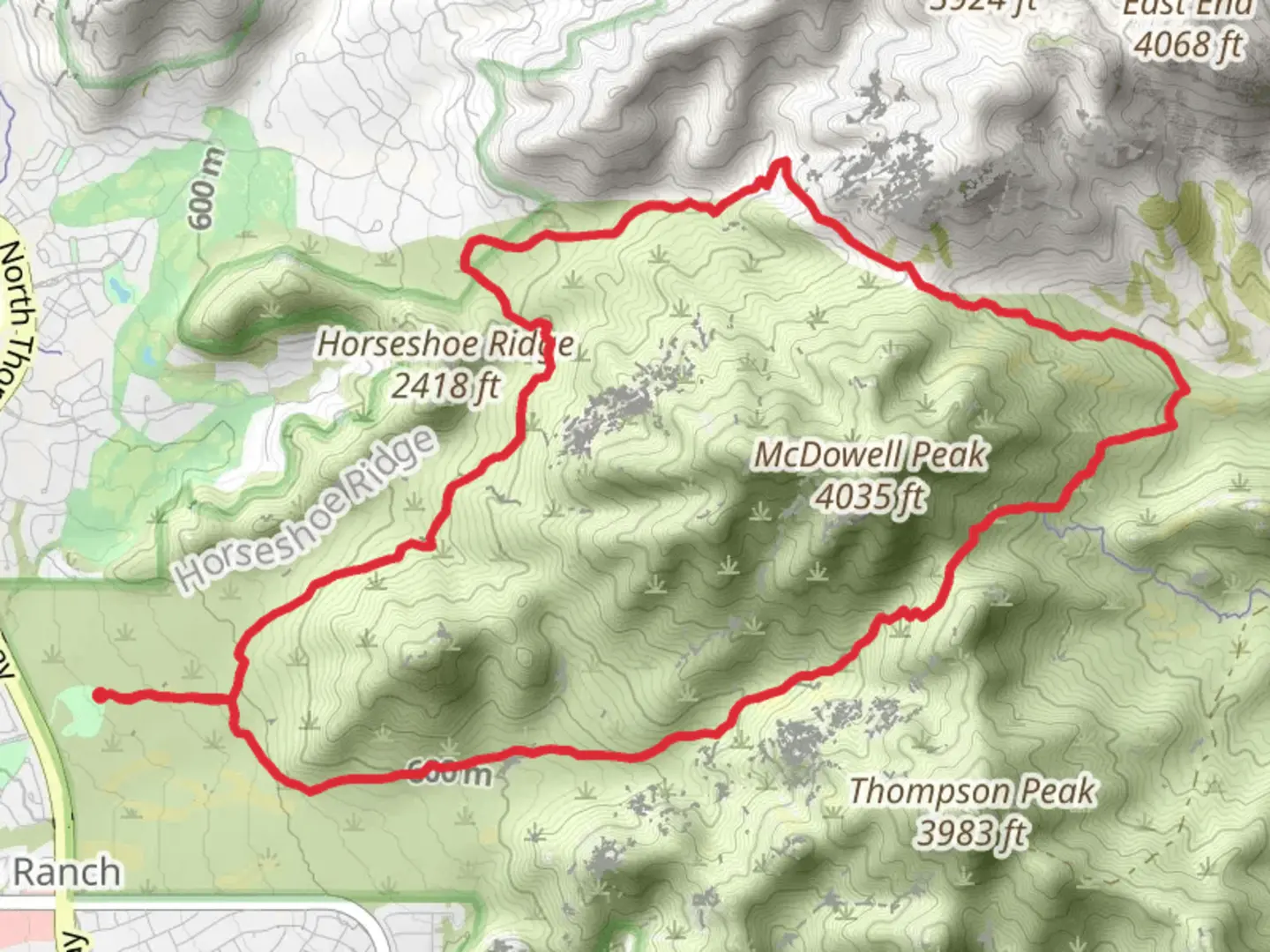 An image depicting the trail Gateway, Tom's Thumb and Bell Pass Loop Trail and its surrounding area.