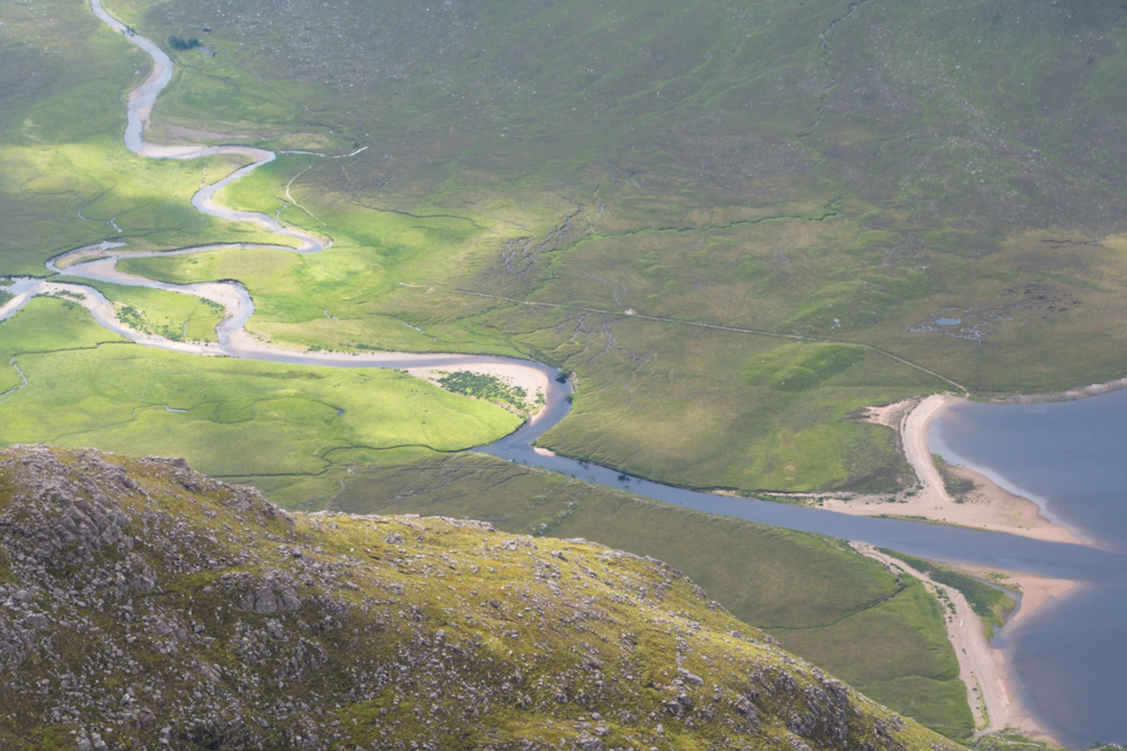 An image depicting the trail A' Mhaighdean Walk and its surrounding area.