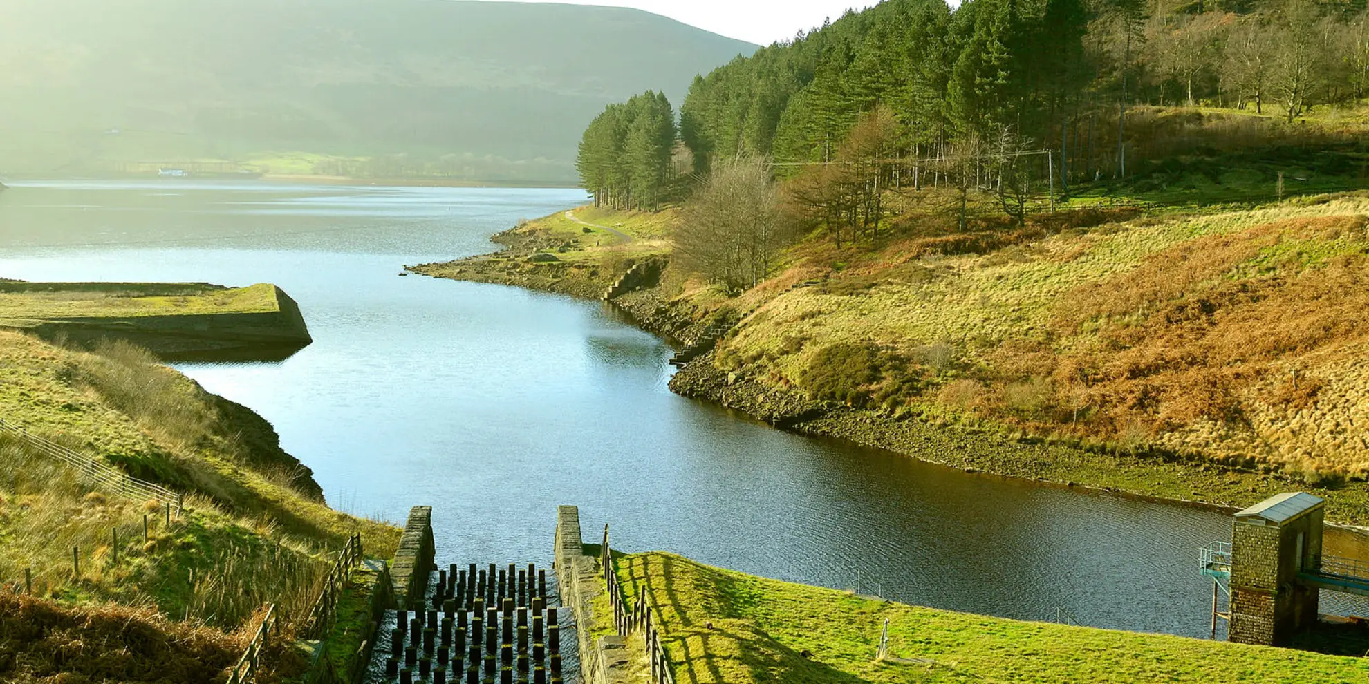 An image depicting the trail Greenfield Reservoir and Raven Stones from Dovestone and its surrounding area.