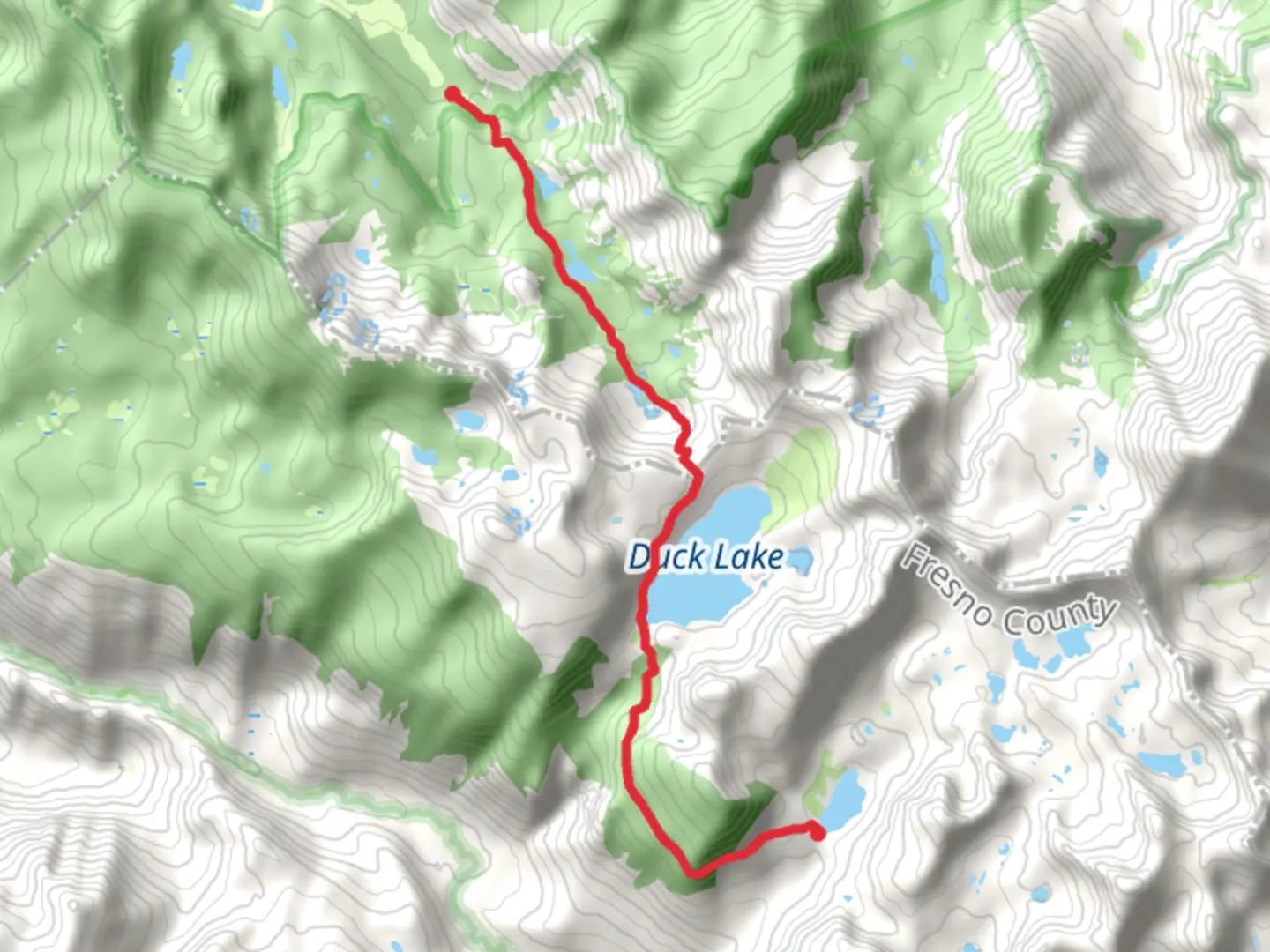 An image depicting the trail Purple Lake via Duck Pass Trail and its surrounding area.