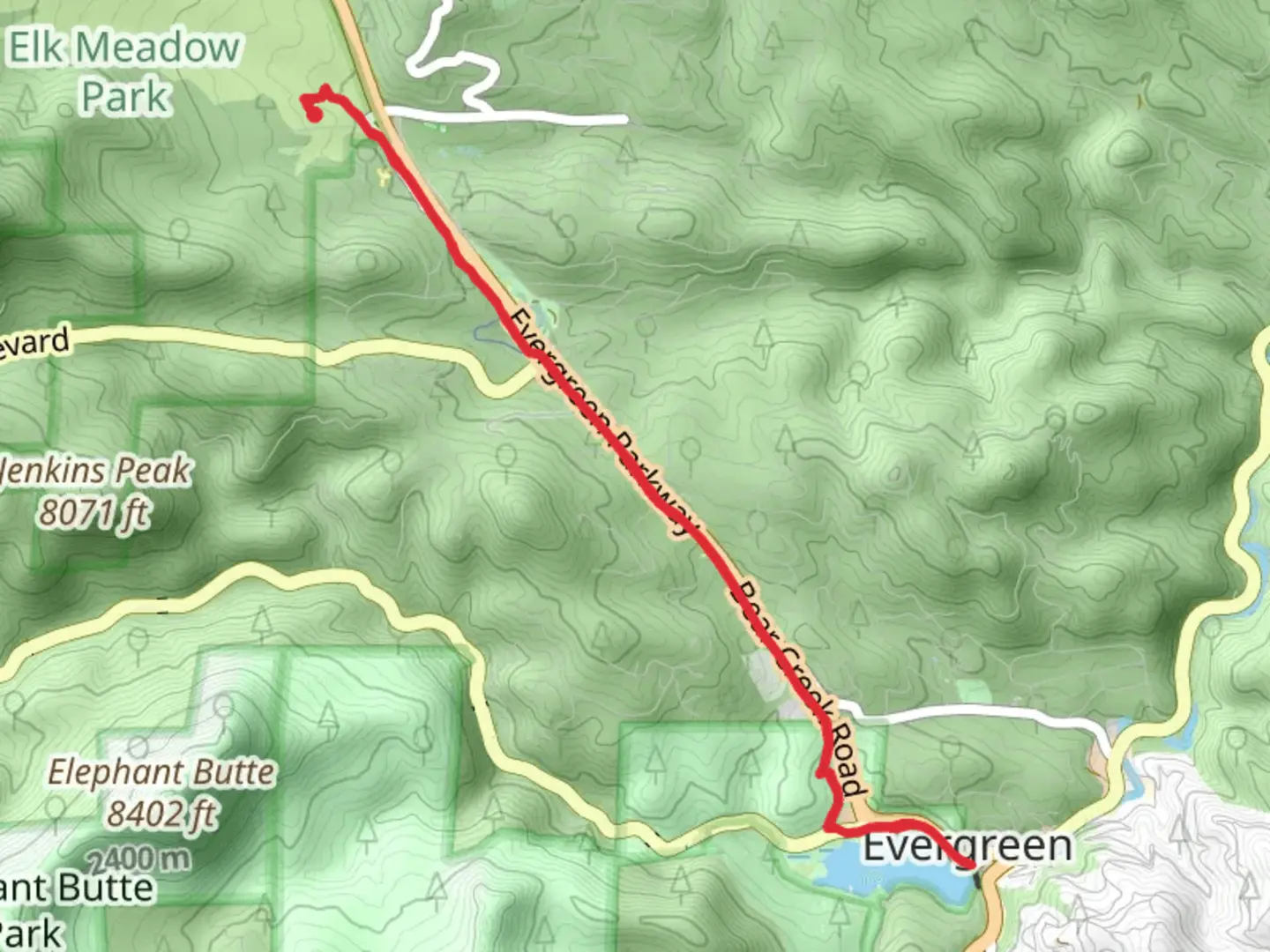 An image depicting the trail Evergreen Lake via Pioneer Trail and its surrounding area.